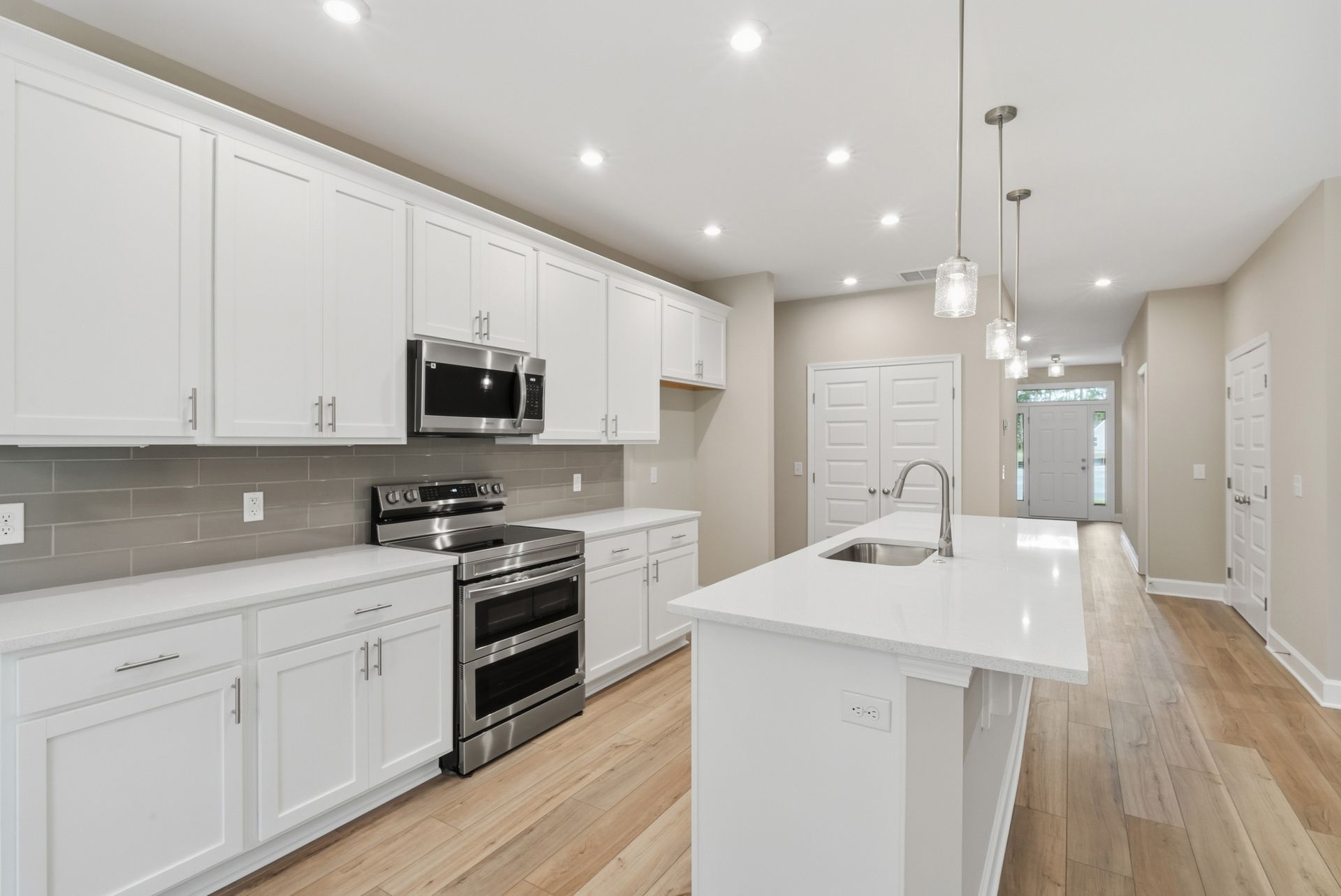 Harbor II Kitchen with White Cabinets and Large Island