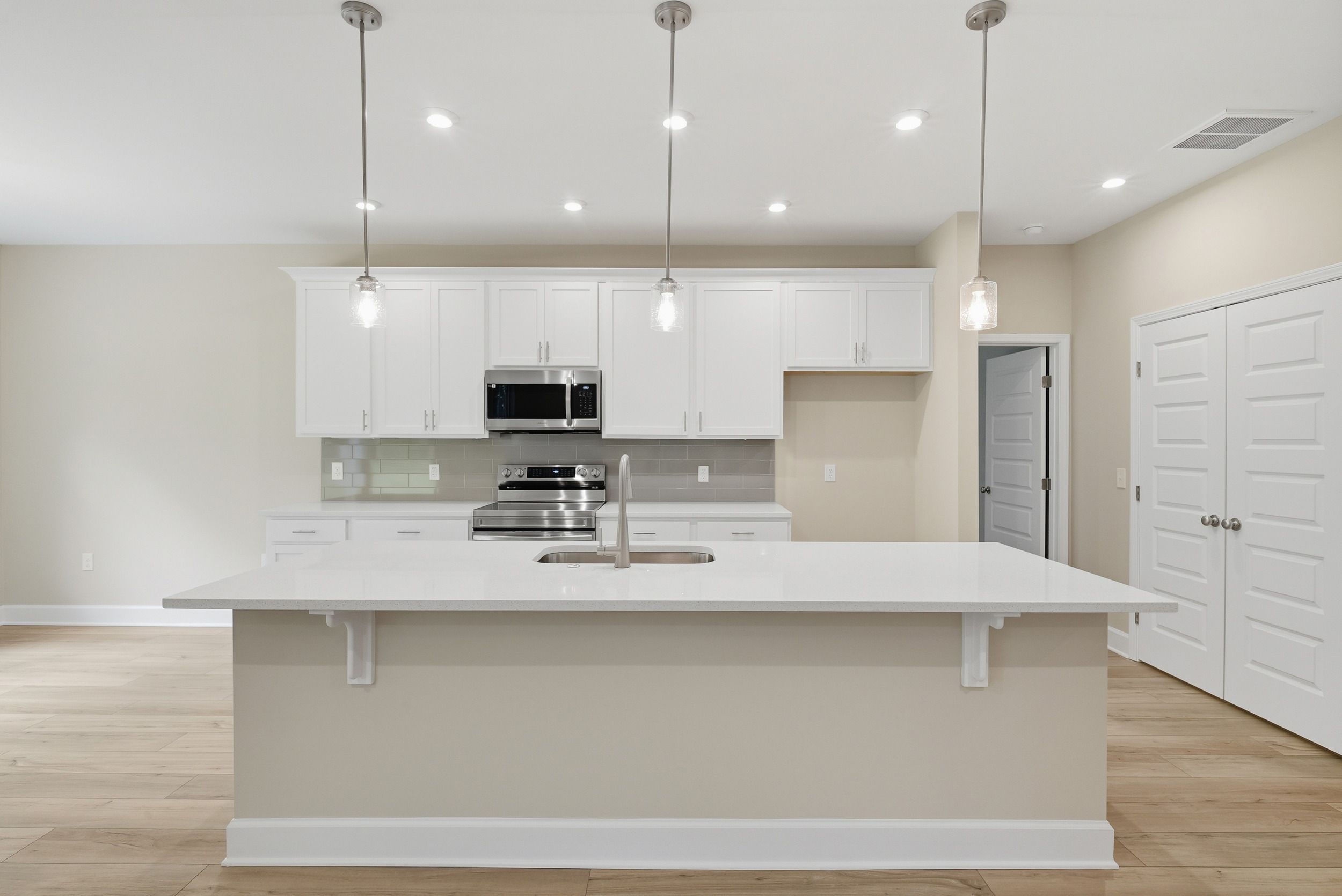 Harbor II Kitchen Elevation with Pendant Lighting