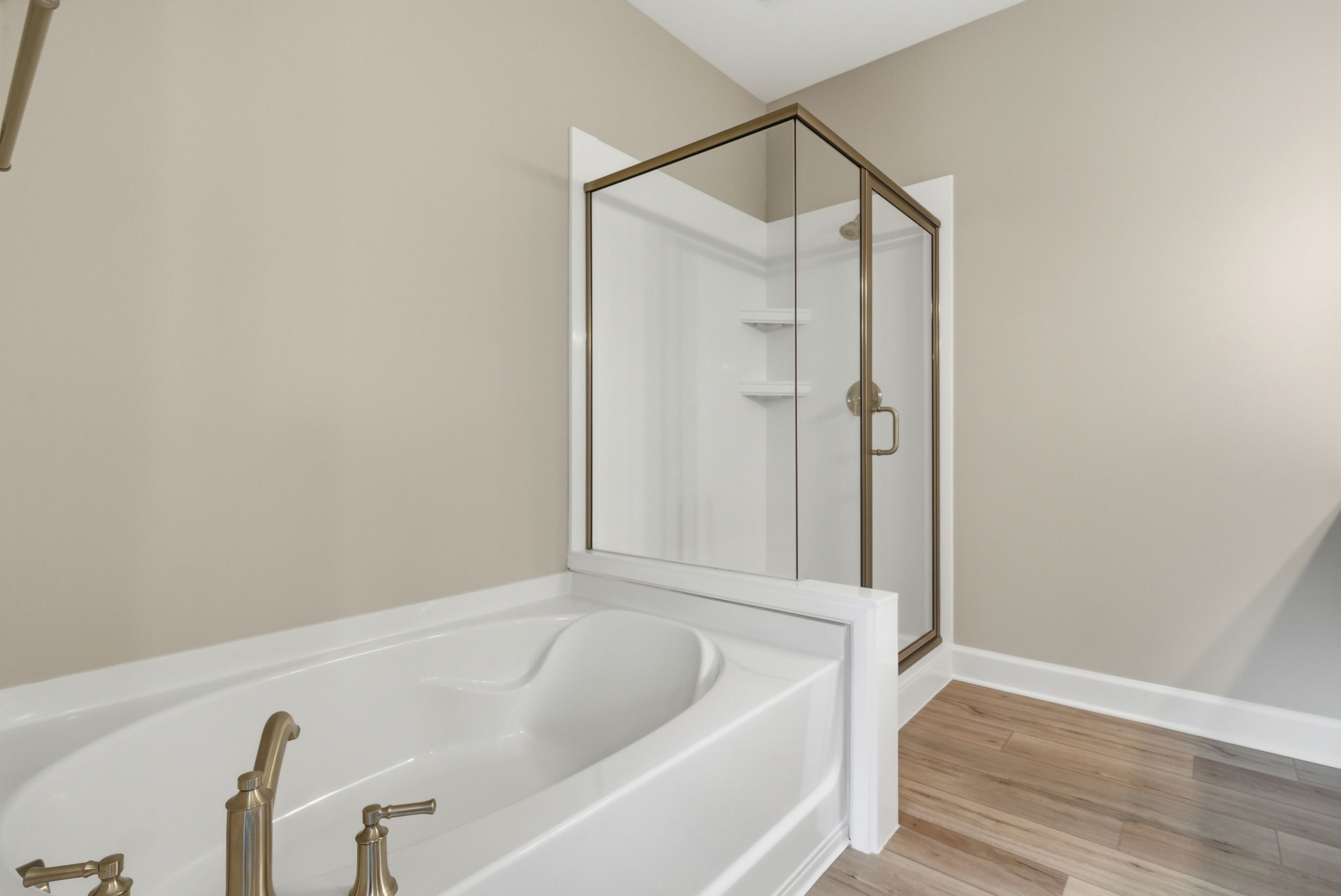 Harbor II Main Primary Bathroom with Marble Shower and Soaker Tub