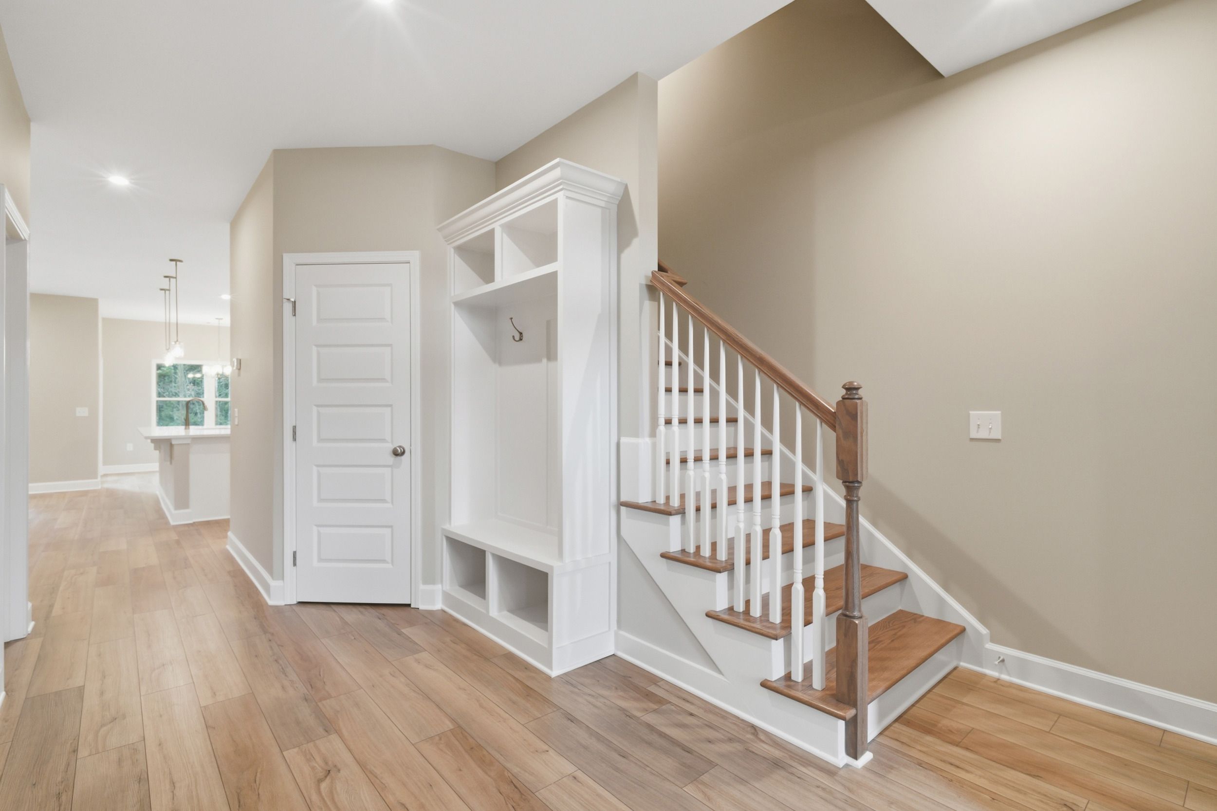 Harbor II Foyer with Drop Zone and Open Rail Staircase