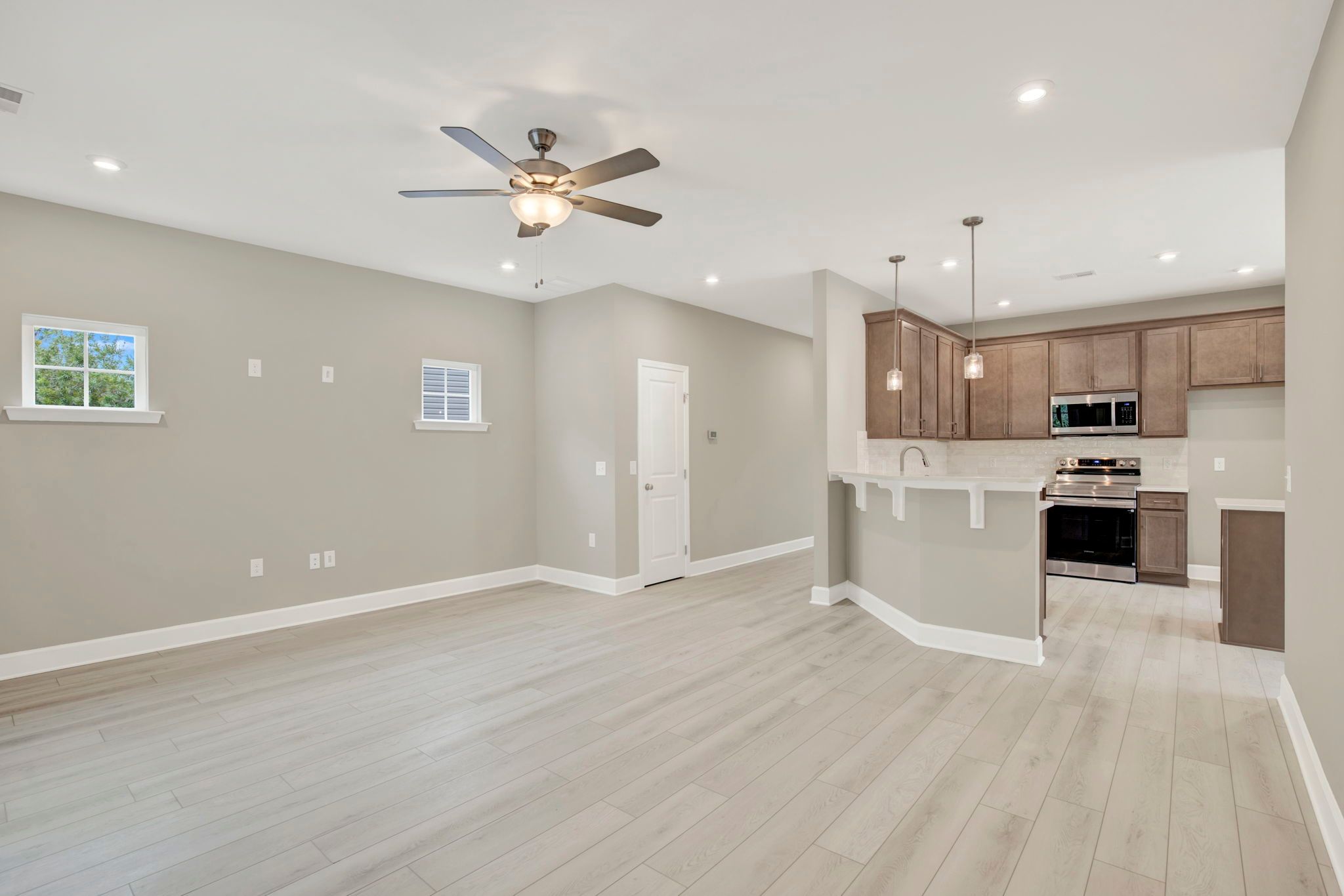 Aspen Plan Great Room and Central Hallway