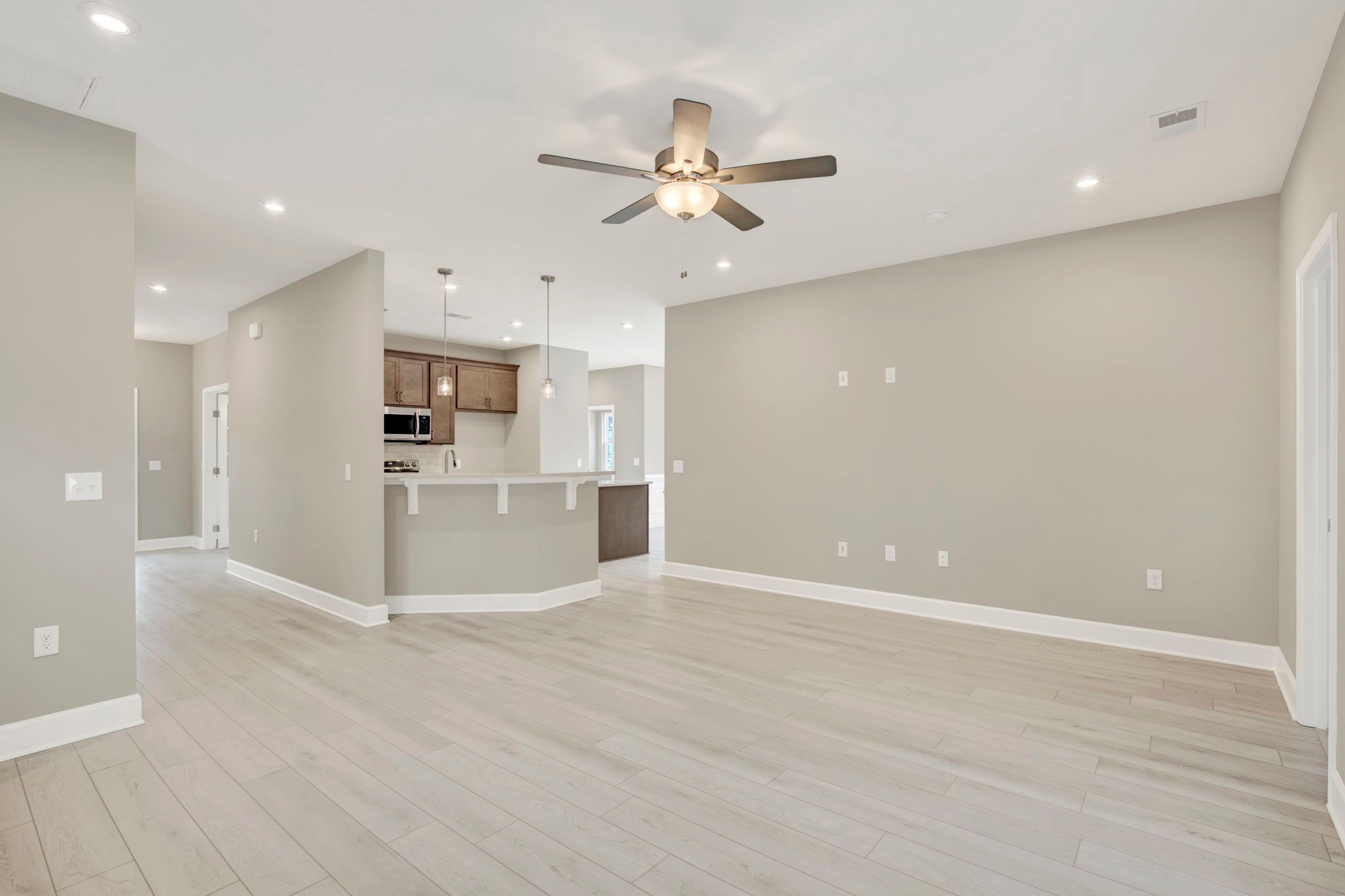 Aspen Plan Great Room View Toward Kitchen