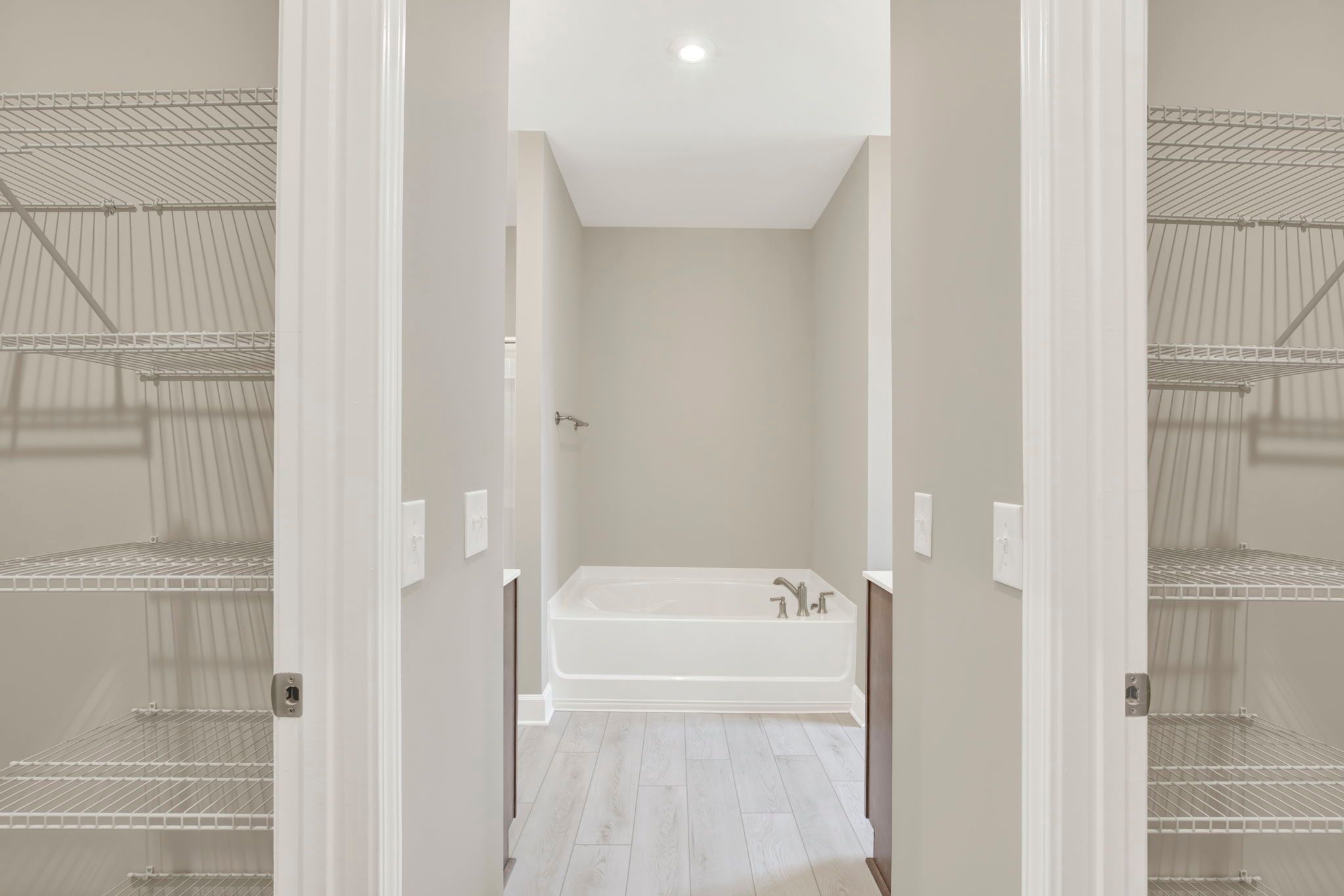 Aspen Plan Owner's Bath Entrance with Dual Walk-in Closets
