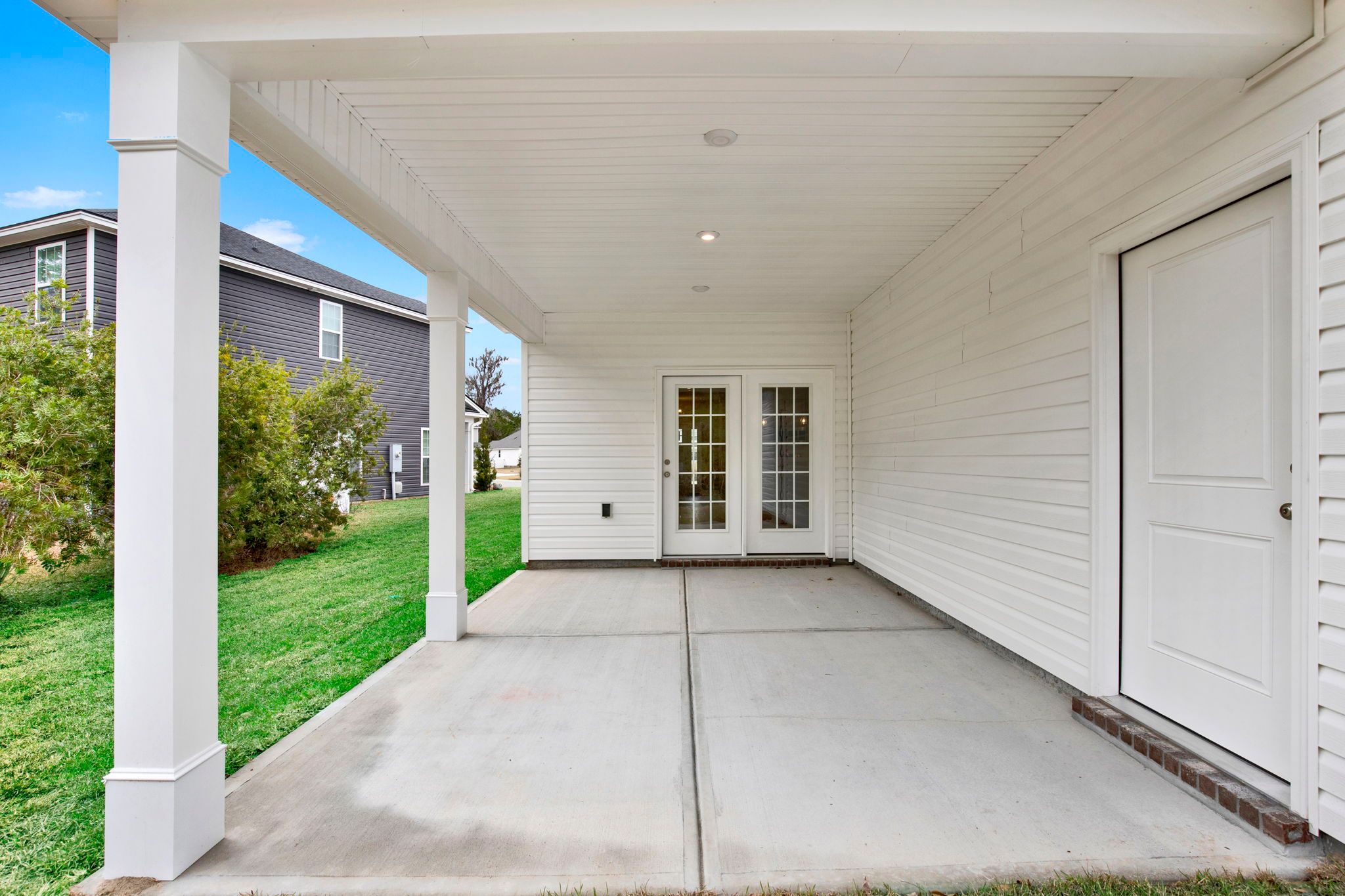 Aspen Plan Covered Back Porch - Outdoor Living & Garage Access