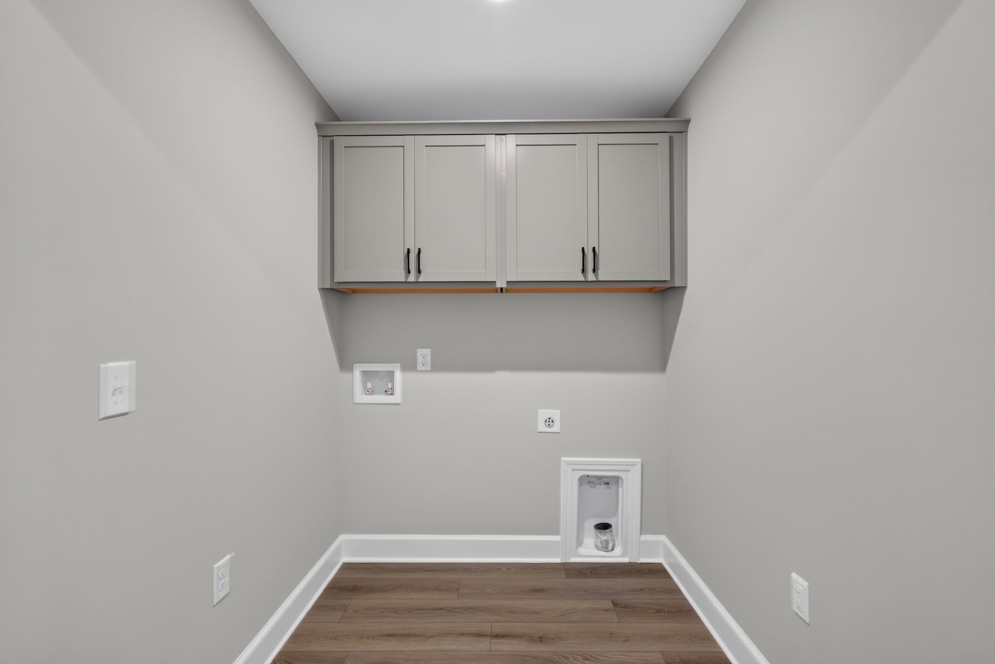 Edisto Second-Floor Laundry Room with Cabinet Storage