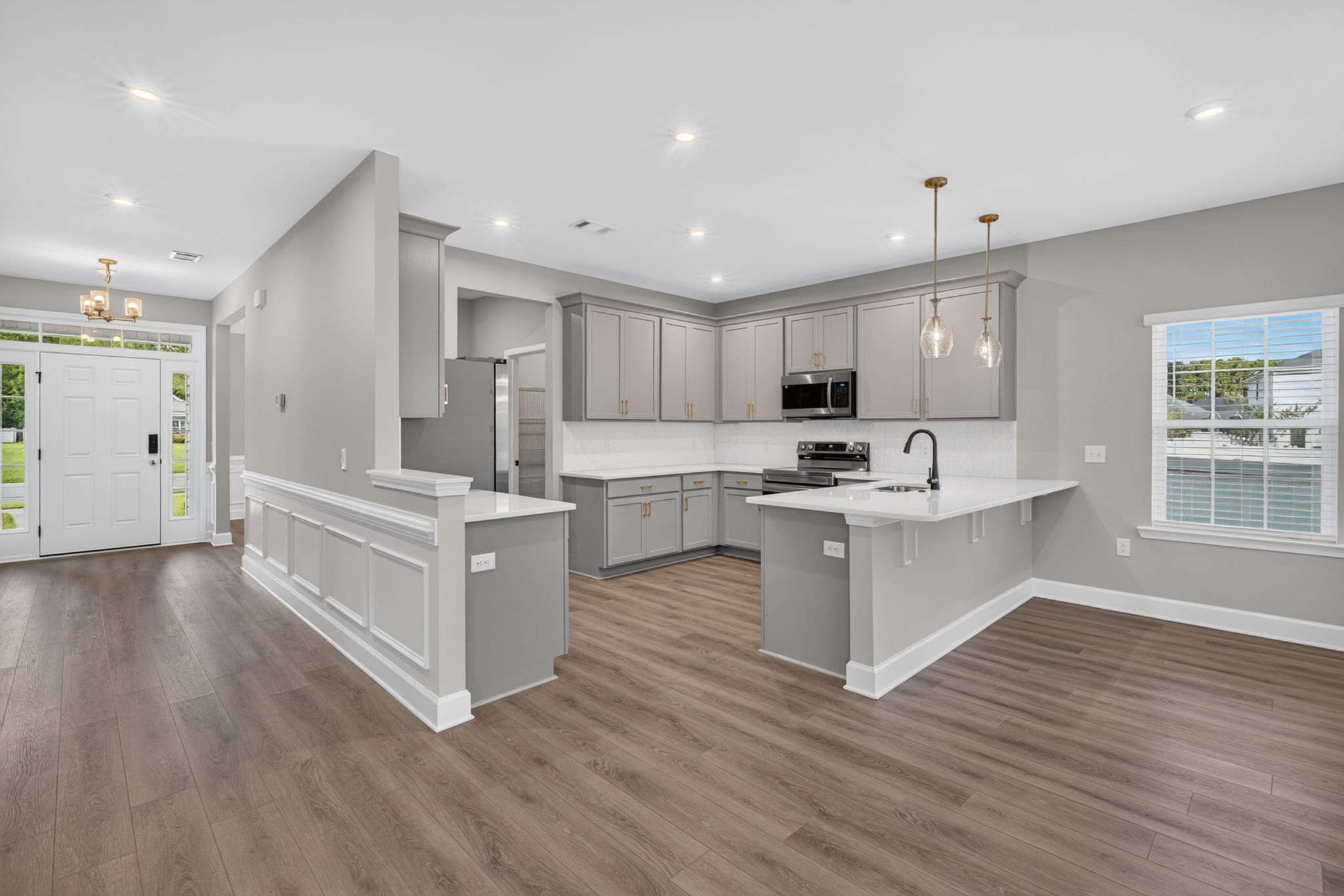 Kitchen & Foyer Entryway View at 245 James Drive – Dunham Marsh