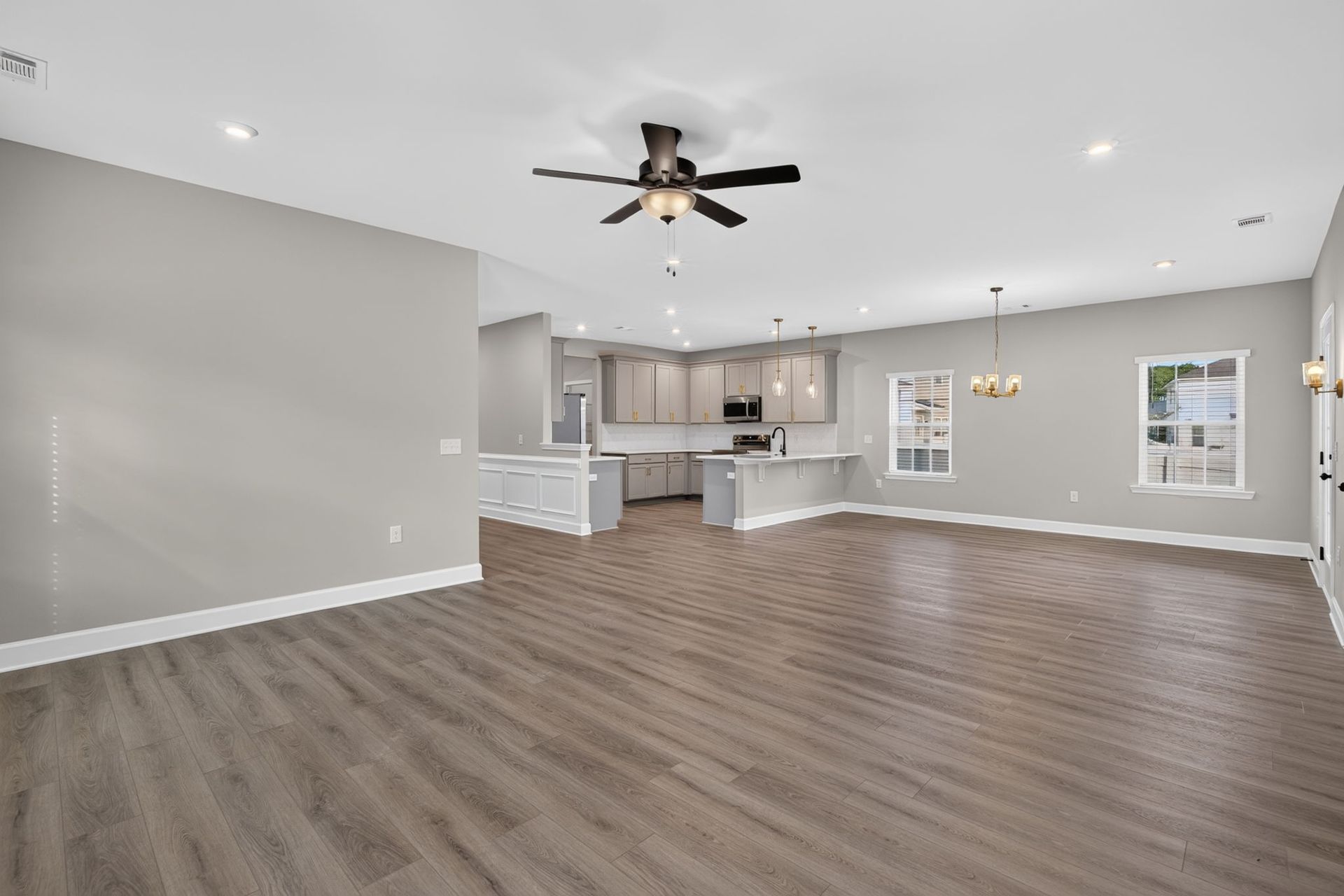 Open Living Room, Breakfast Area & Foyer Hallway at 245 James Drive – Dunham Marsh