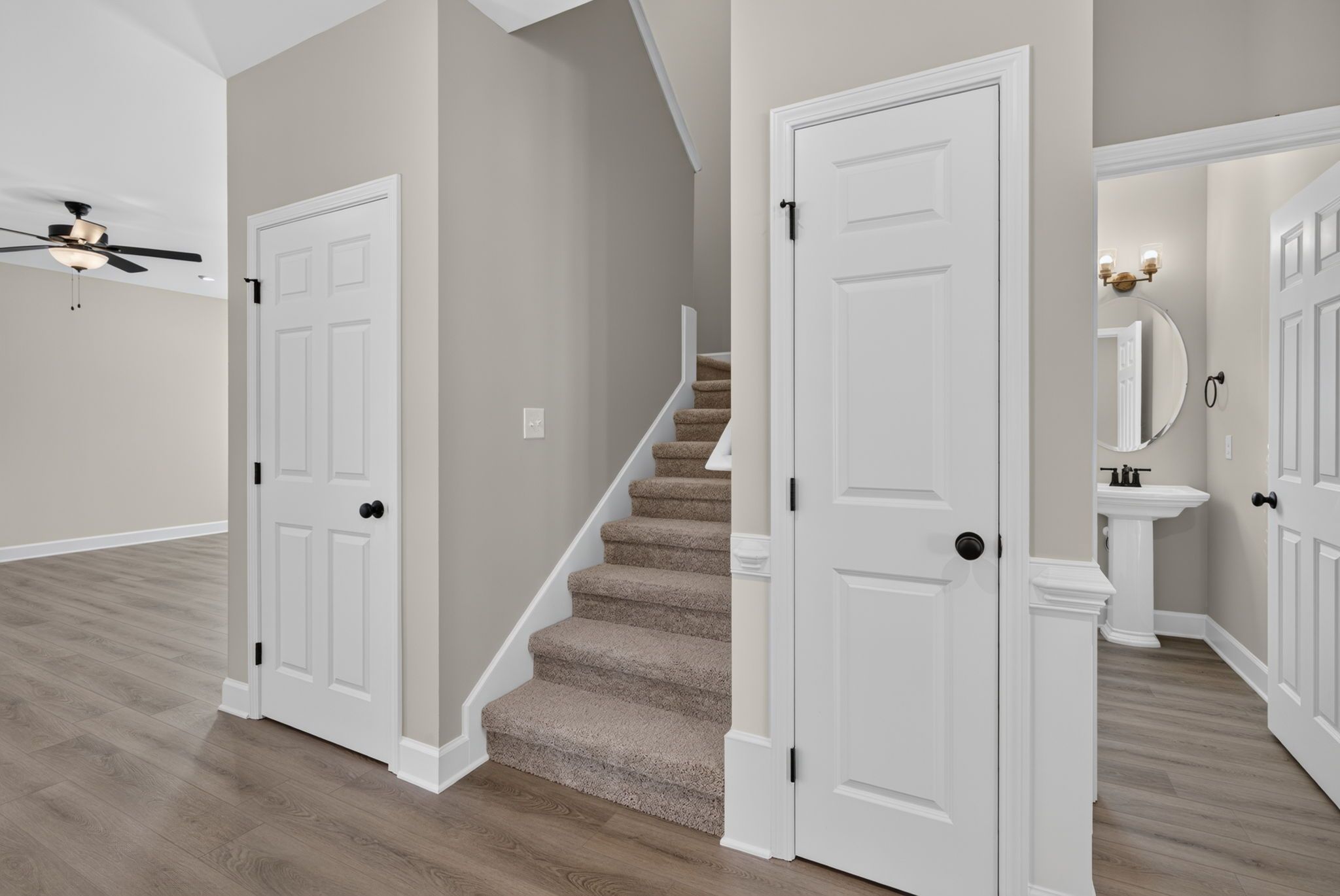 Foyer Storage Closets & Powder Room at 245 James Drive – Dunham Marsh