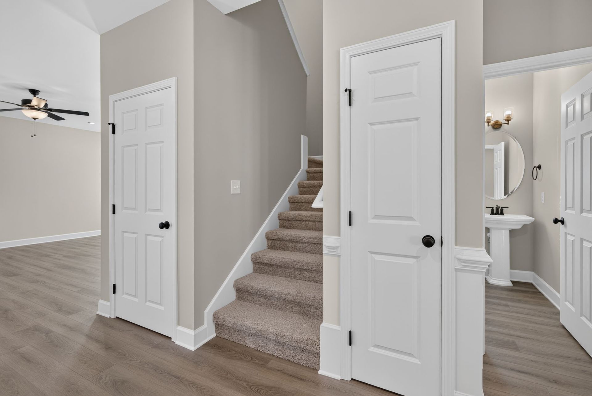 Foyer Storage Closets & Powder Room at 245 James Drive – Dunham Marsh