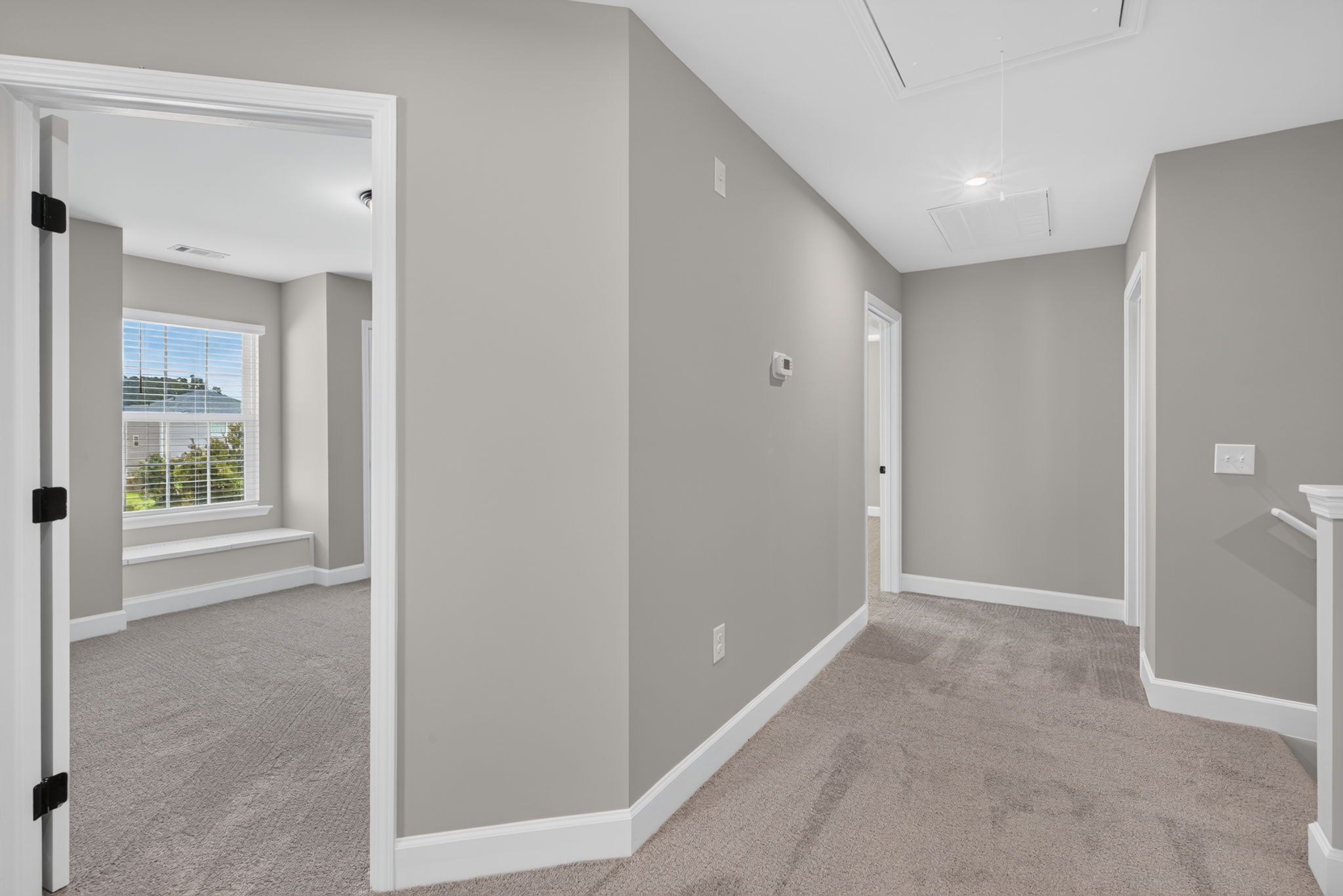 Upstairs Hallway Looking into Bedroom 4 at 245 James Drive – Dunham Marsh