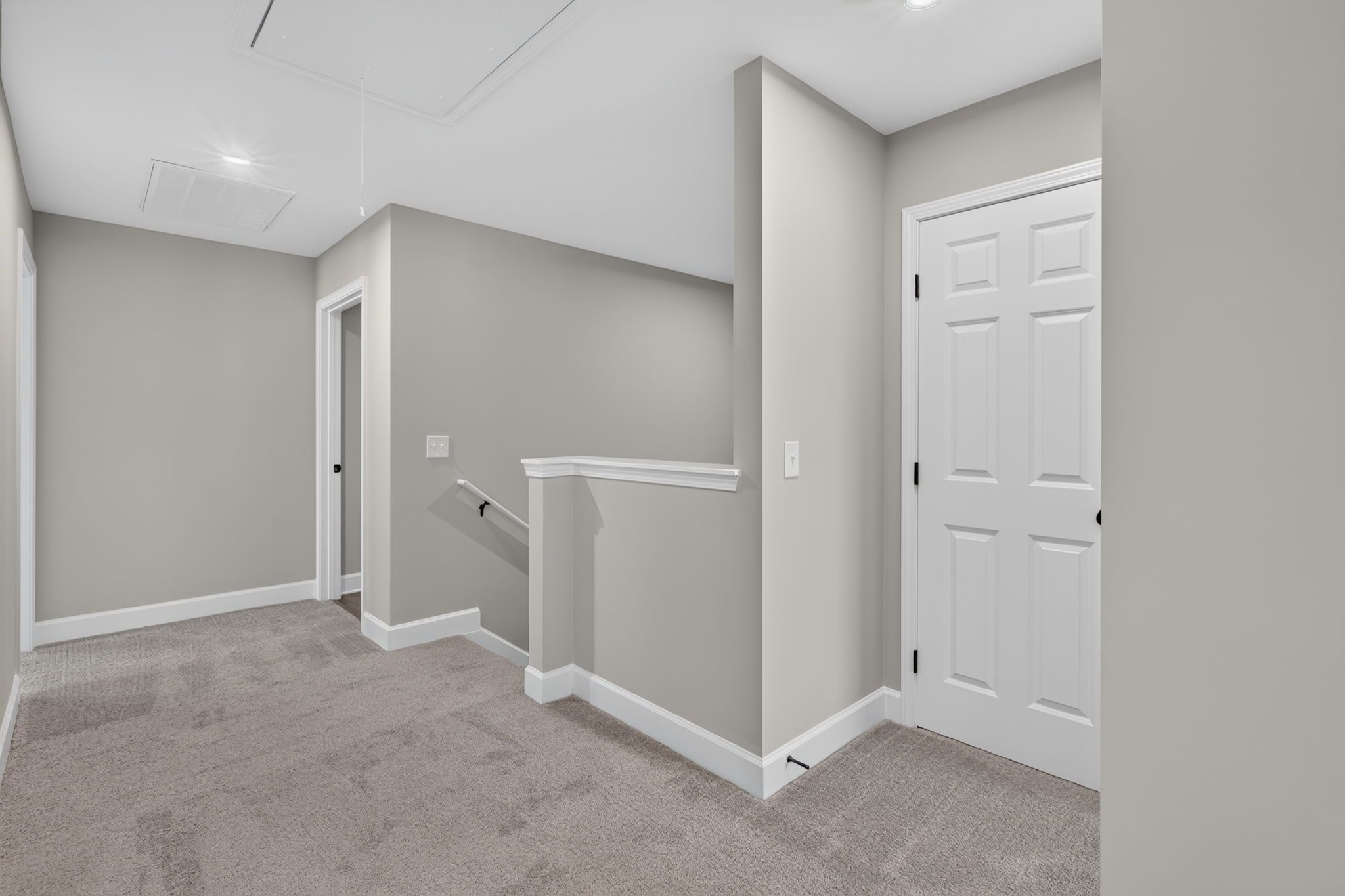 Upstairs Landing, Linen Closet & Laundry Room Access at 245 James Drive – Dunham Marsh