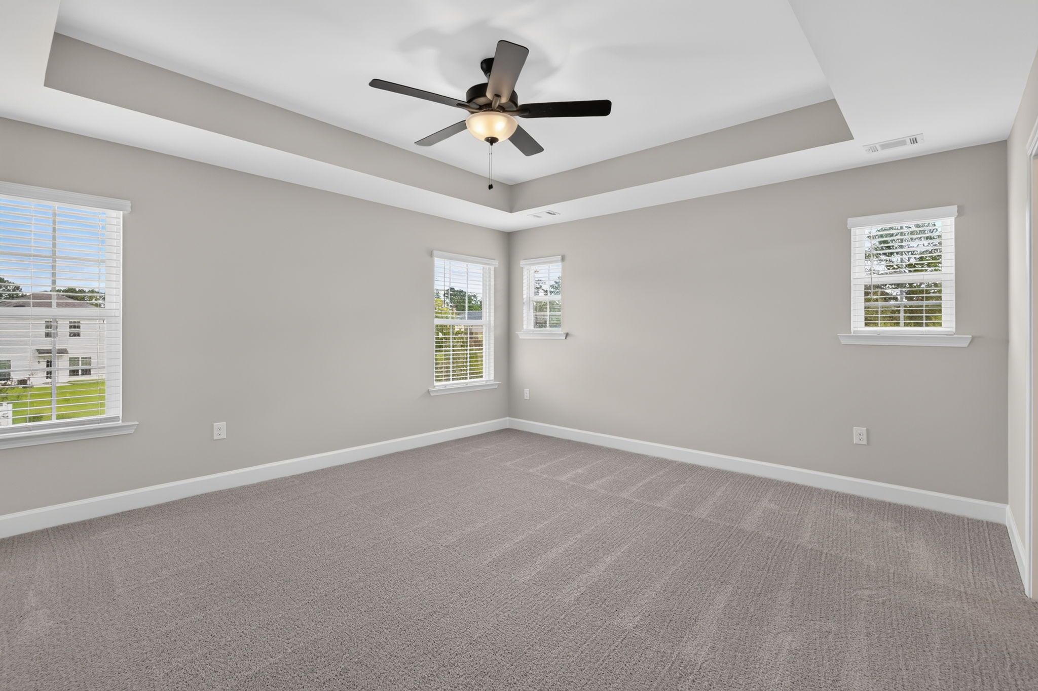 Primary Bedroom with Tray Ceiling at 245 James Drive – Dunham Marsh