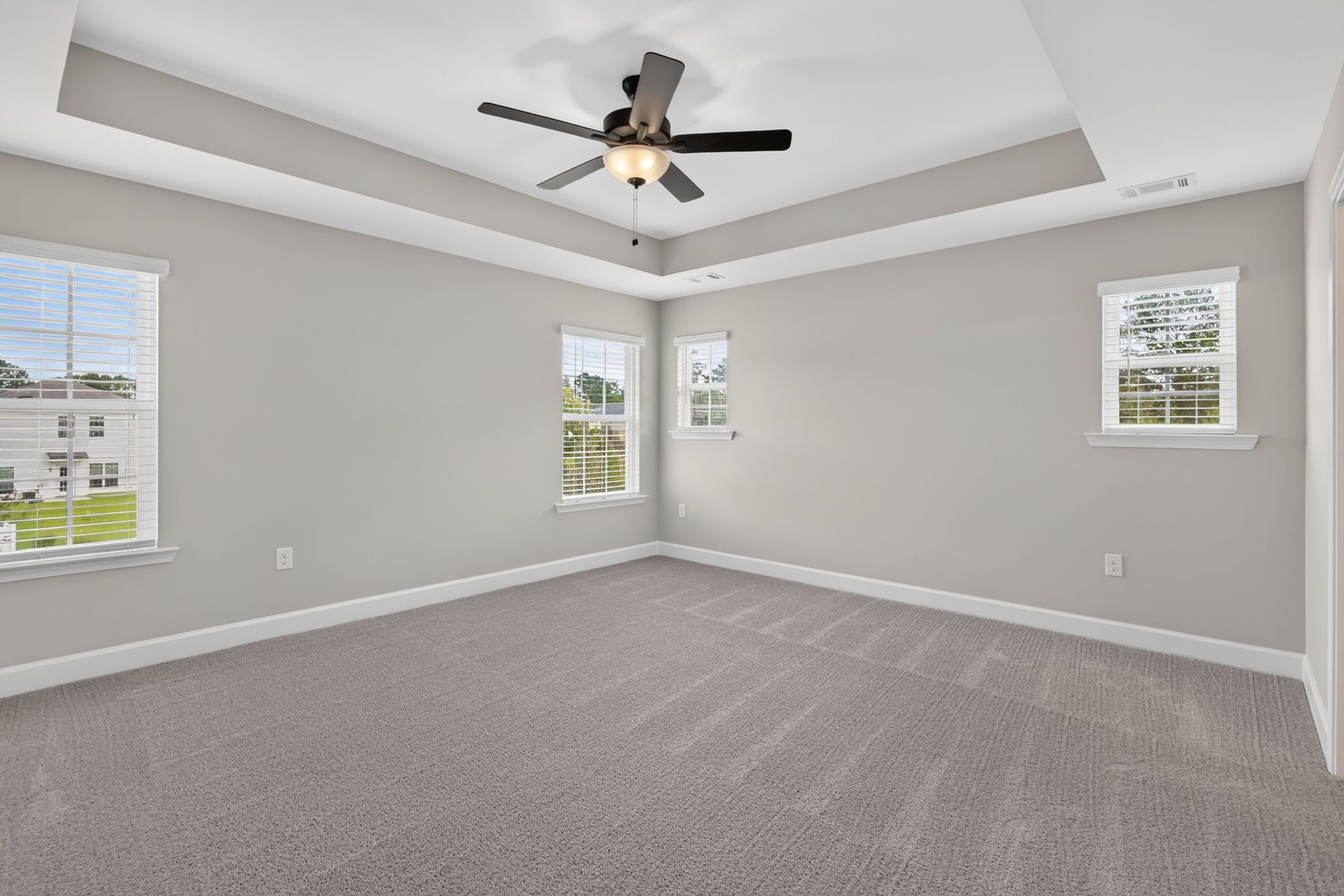 Primary Bedroom with Tray Ceiling at 245 James Drive – Dunham Marsh