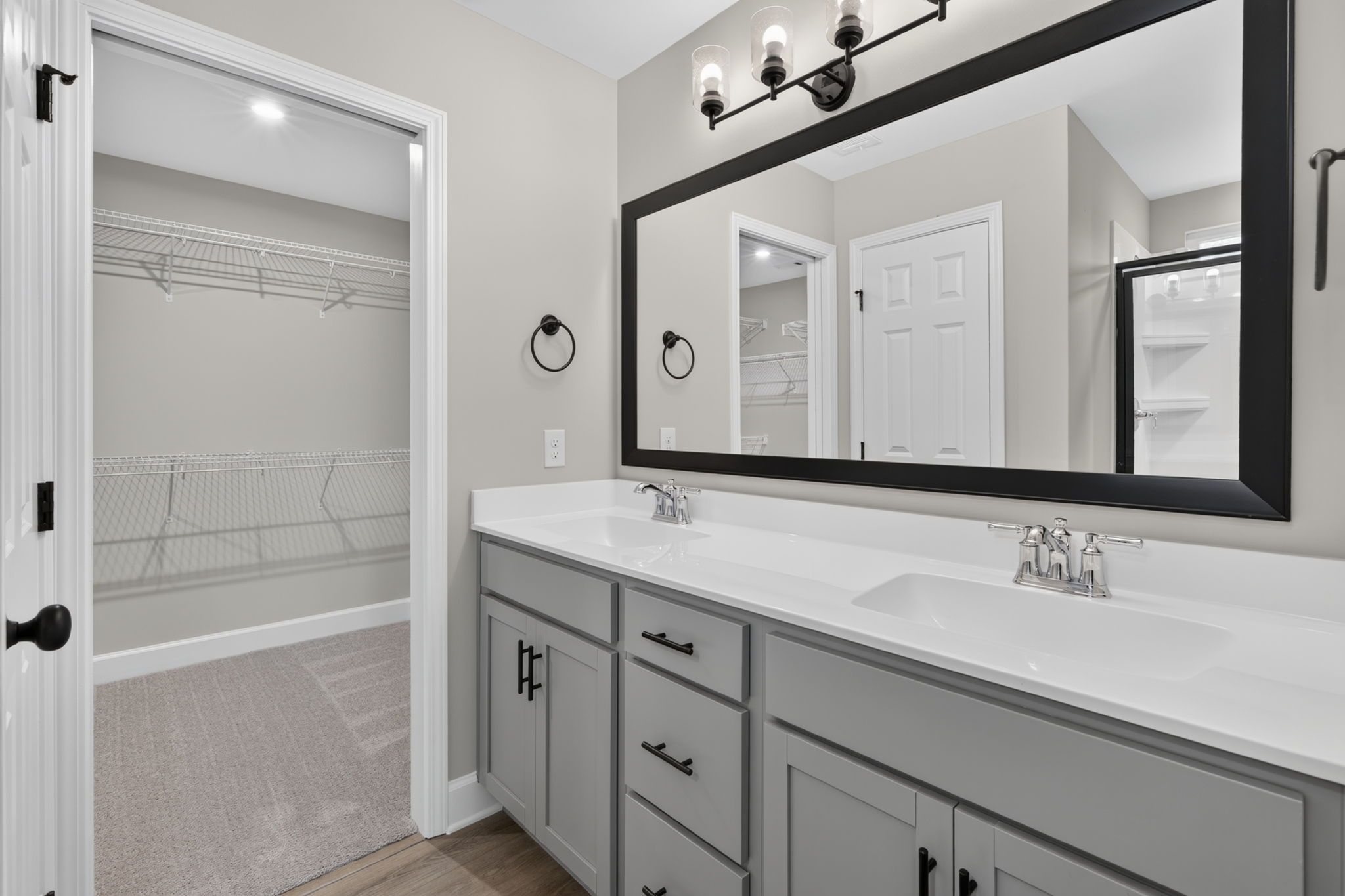 Primary En Suite Bathroom with Walk-In Closet & Linen Closet at 245 James Drive – Dunham Marsh