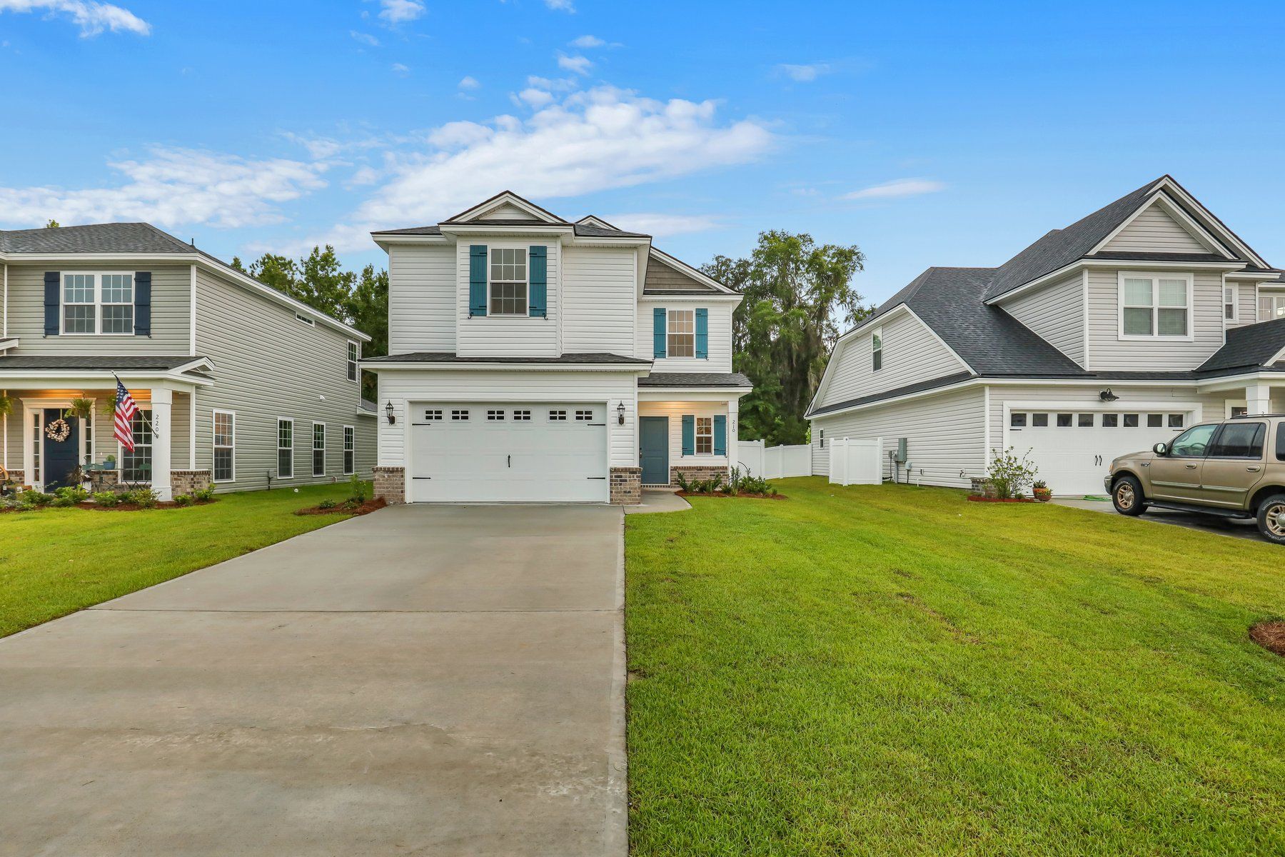Madison – Front Exterior with Blue Shutters