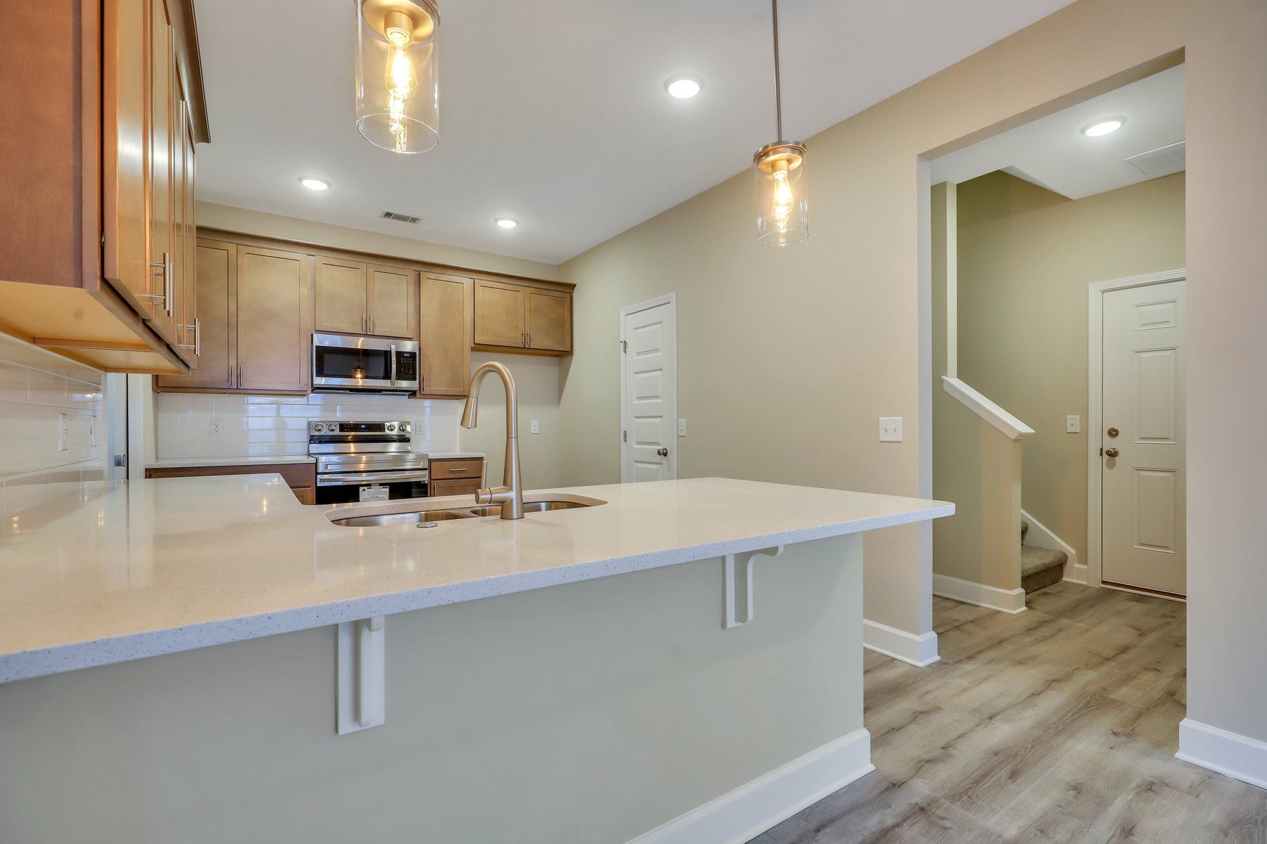 Hatteras – Kitchen View toward Garage Entry and Stairs