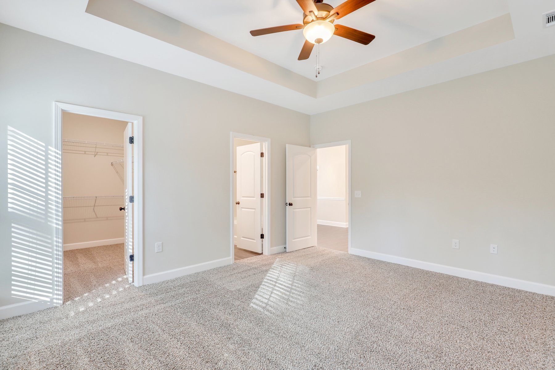 Hatteras – Primary Bedroom View toward Bath and WIC