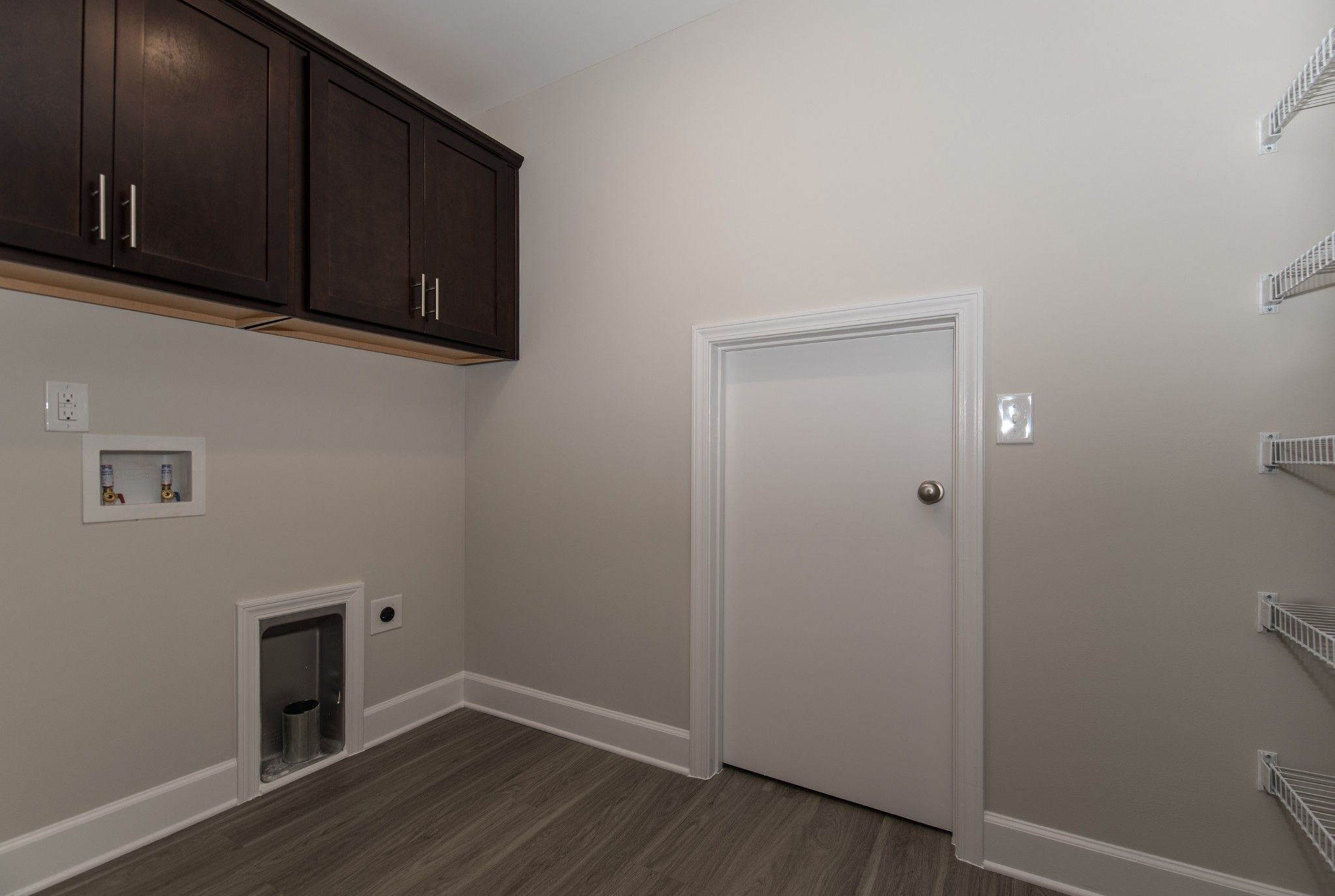 Hilton - Laundry Room with Cabinets | Ernest Homes