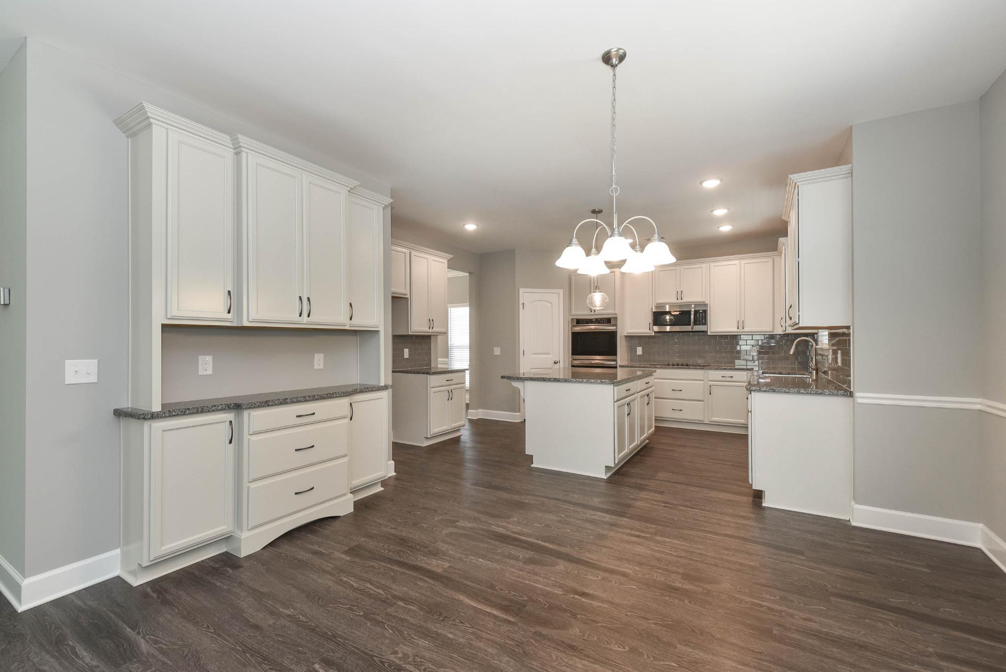 Greybeard - Kitchen with custom cabinetry in Breakfast area | Ernest Homes