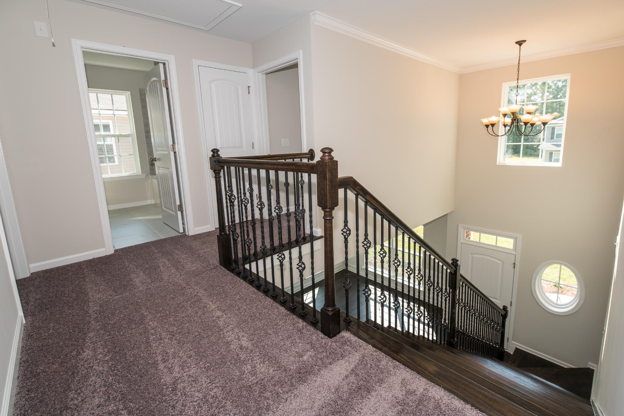 Blackbeard - Upstairs hallway two story foyer   | Ernest Homes