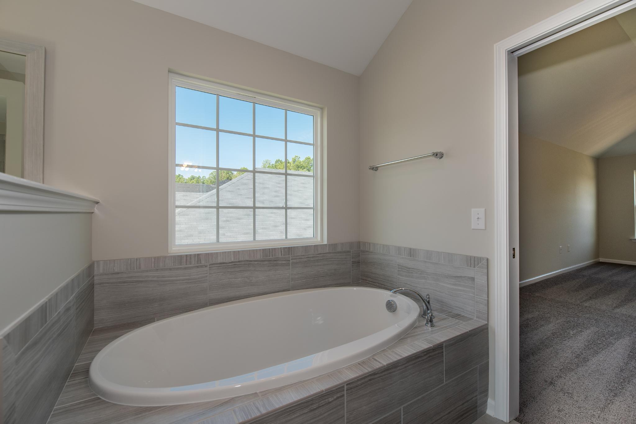 Blackbeard - Tile Surround drop in tub | Ernest Homes
