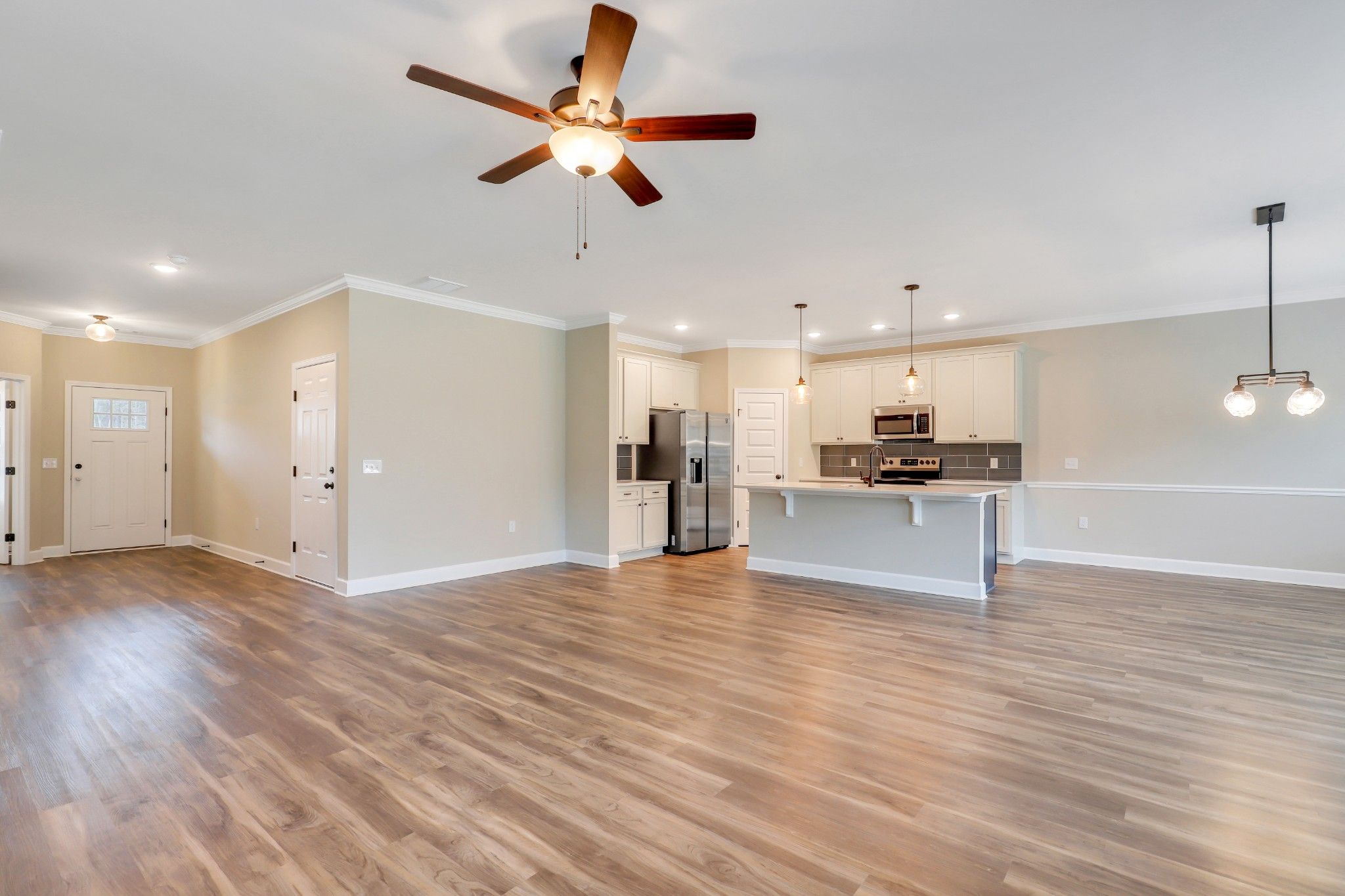 Seabrook - Family Room view to Kitchen, foyer and morning room | Ernest Homes
