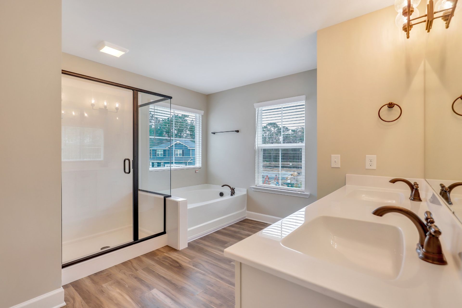Seabrook Owner's Bath with Dual Vanities and Glass Shower