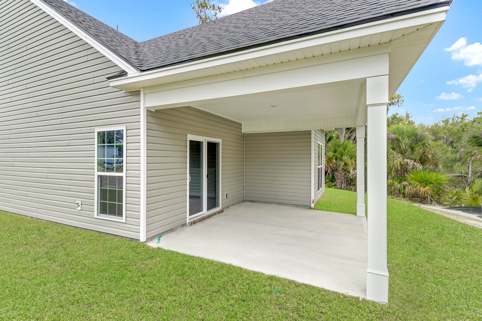 Harbor – Back Exterior with Outdoor Living Space | Ernest Homes