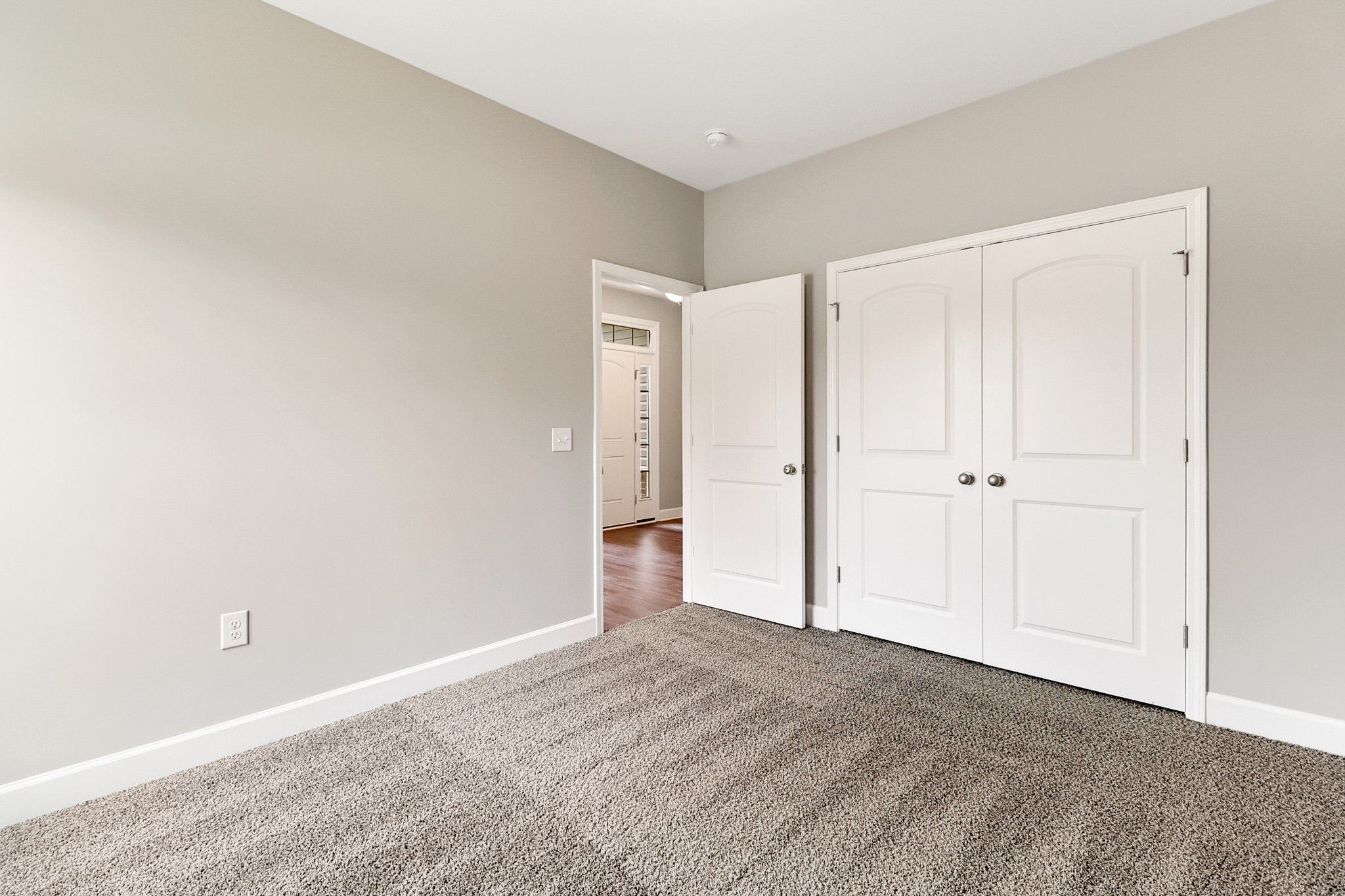 Harbor – Bedroom 3 Closet with Double Doors | Ernest Homes