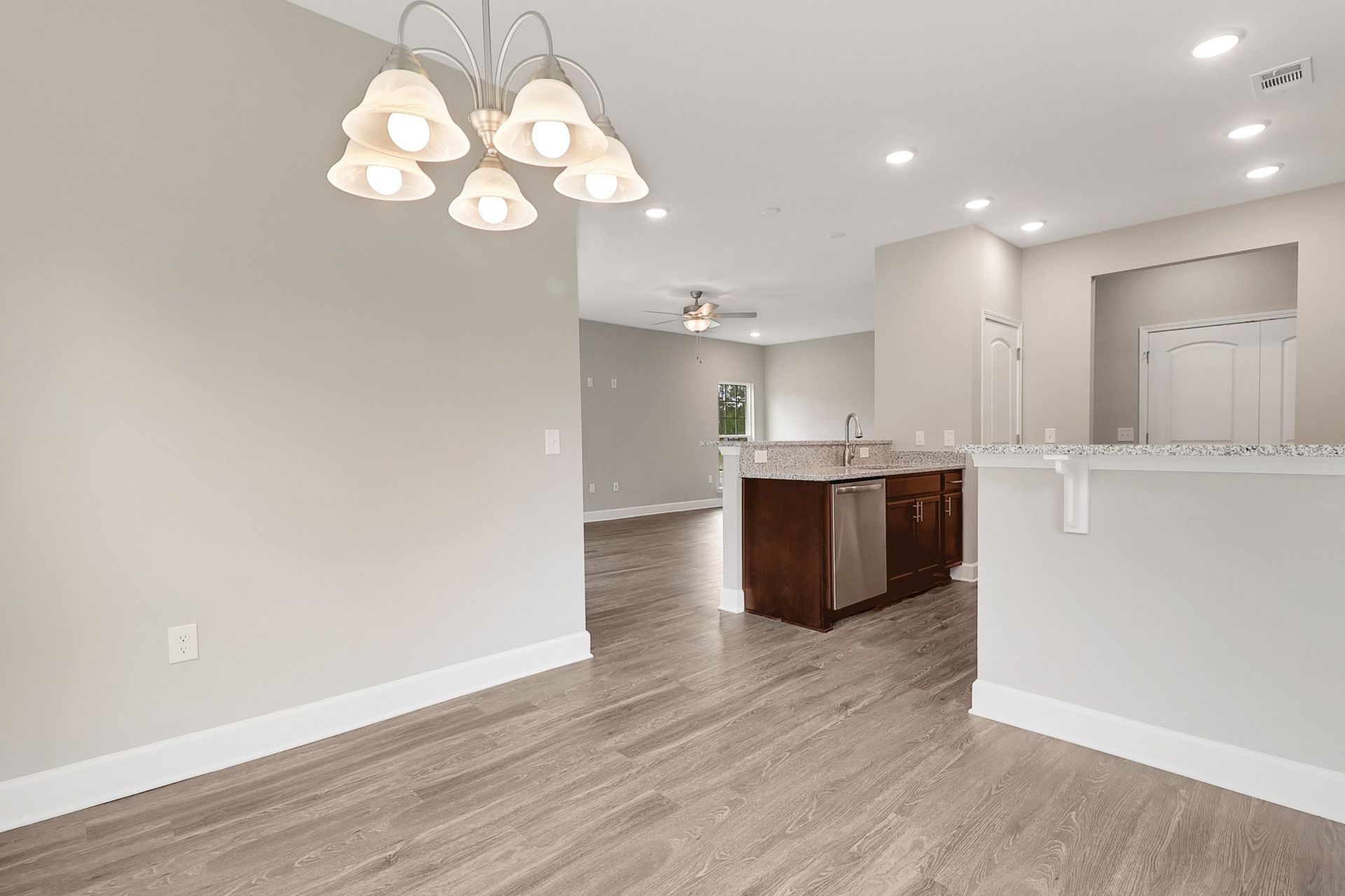 Harbor – Open Breakfast Area Overlooking Kitchen & Living Room | Ernest Homes