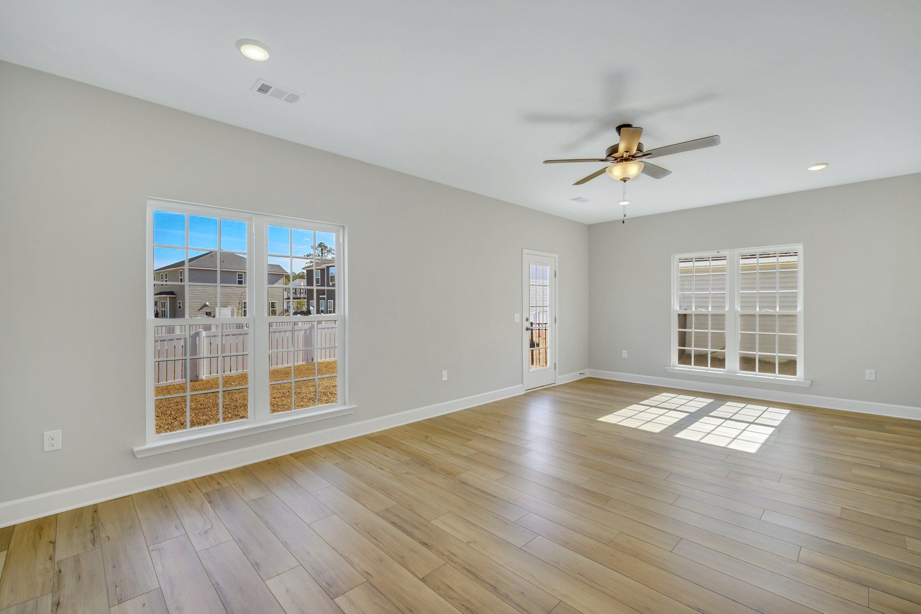 Fripp – Living Room with Backyard Views