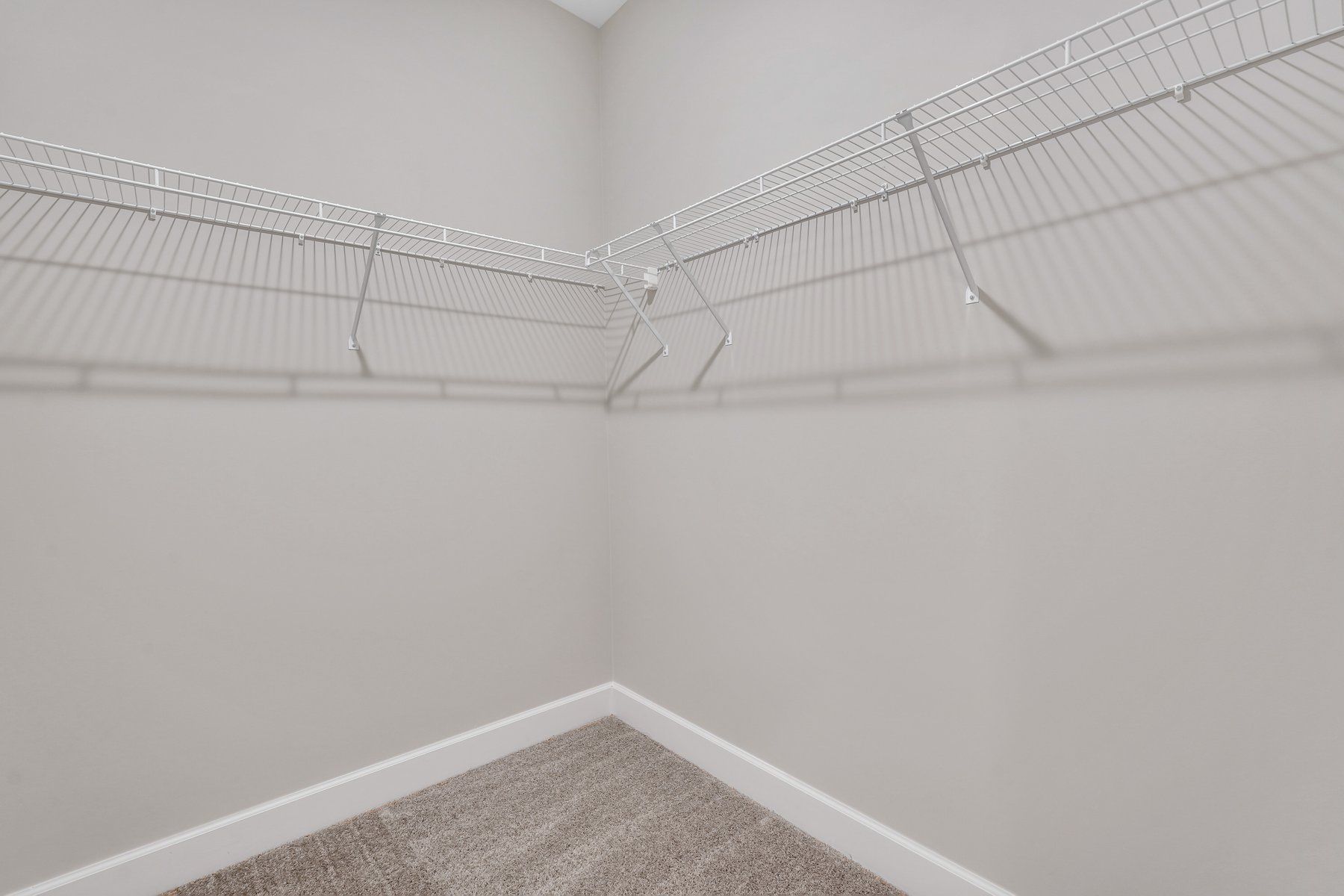 New Haven Townhome A - Owner's Bathroom Suite Walk- in Closet | Ernest Homes