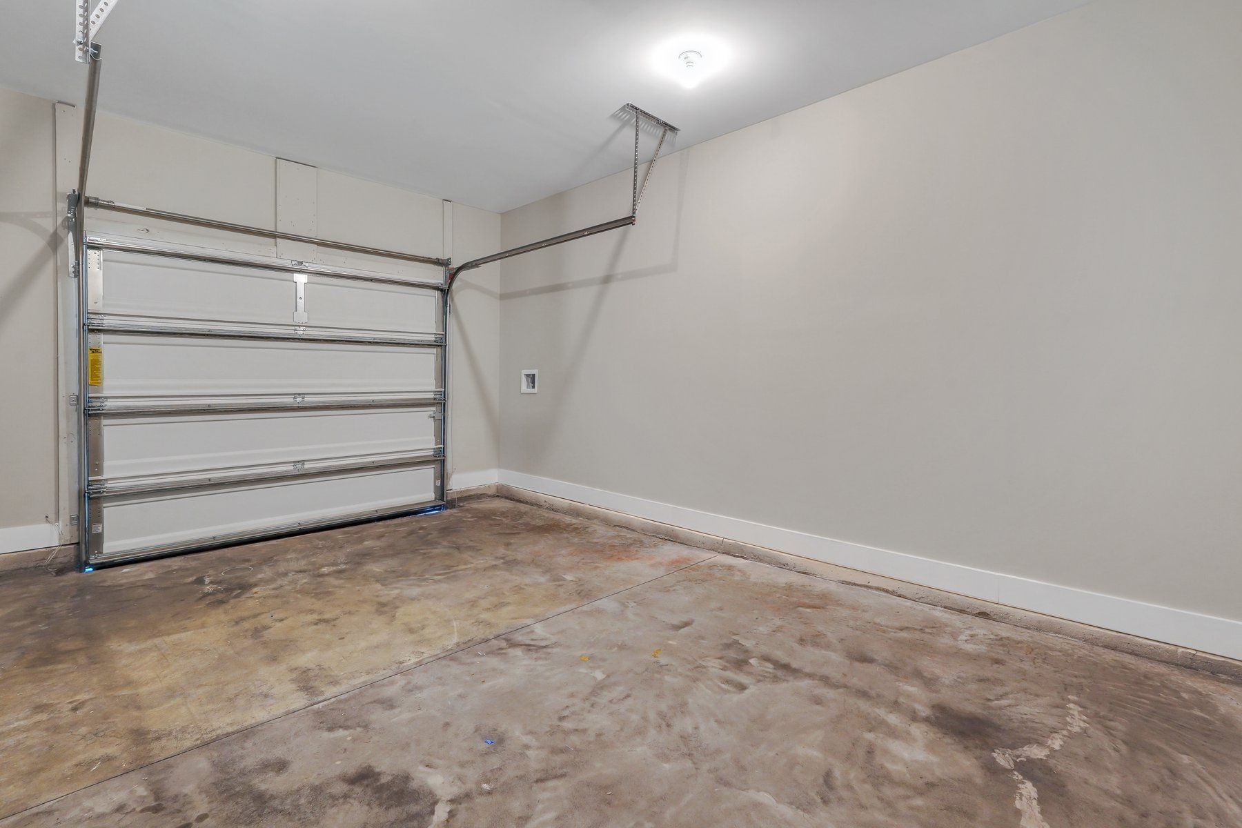 New Haven Townhomes A Finished One Car Garage | Ernest Homes