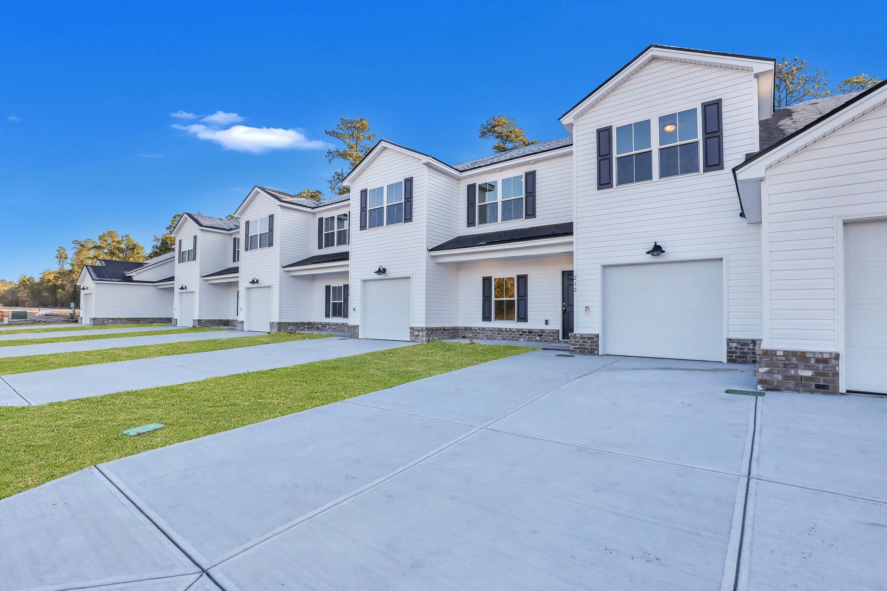New Haven Townhome B - Angled Front Elevation | Ernest Homes
