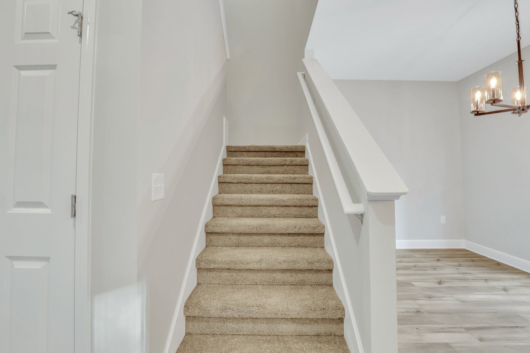 New Haven Townhome B - Carpeted Stairwell to second floor at 246 Haisley Run | Ernest Homes