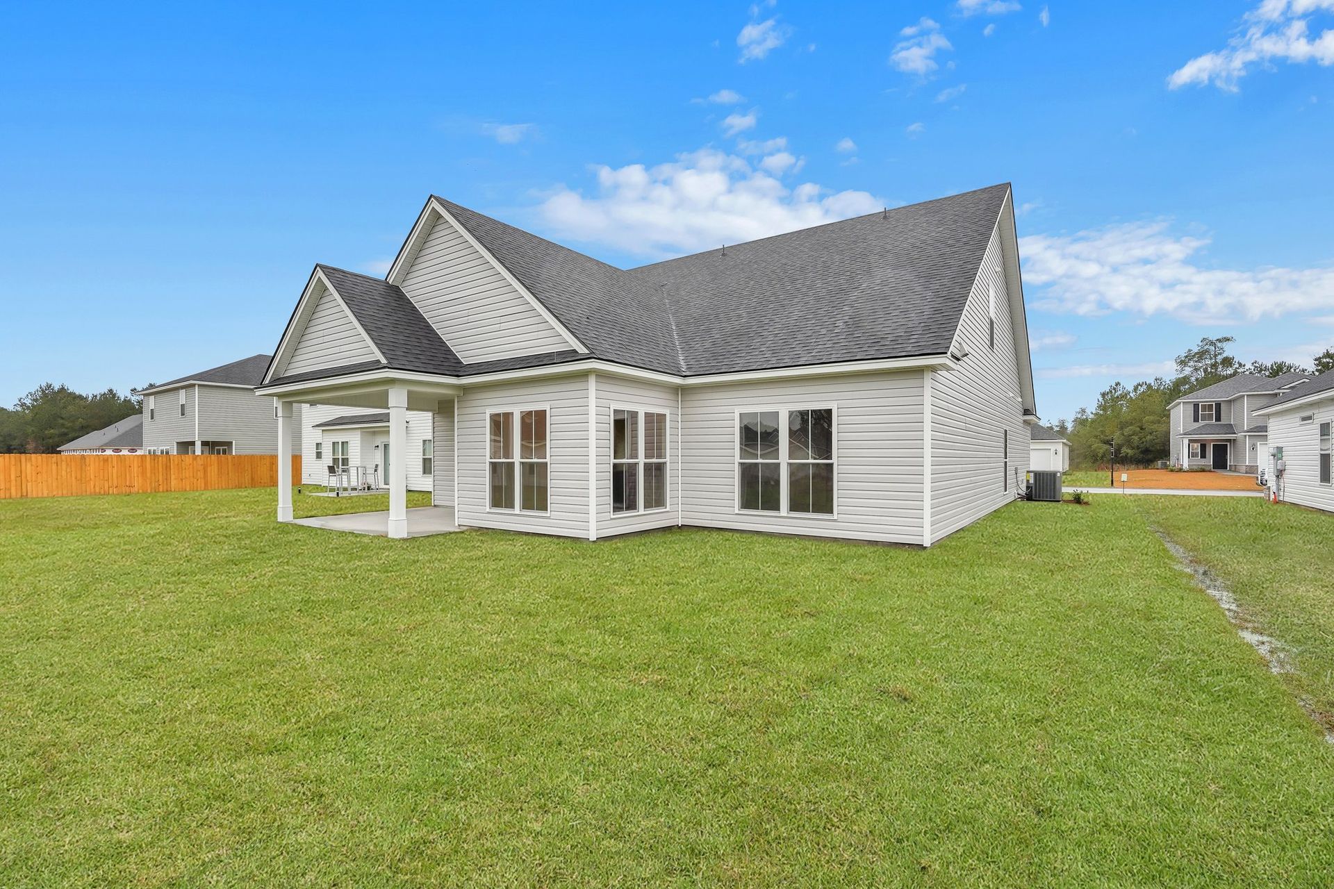 Harbor – Angled Rear Exterior View with Covered Porch | Ernest Homes
