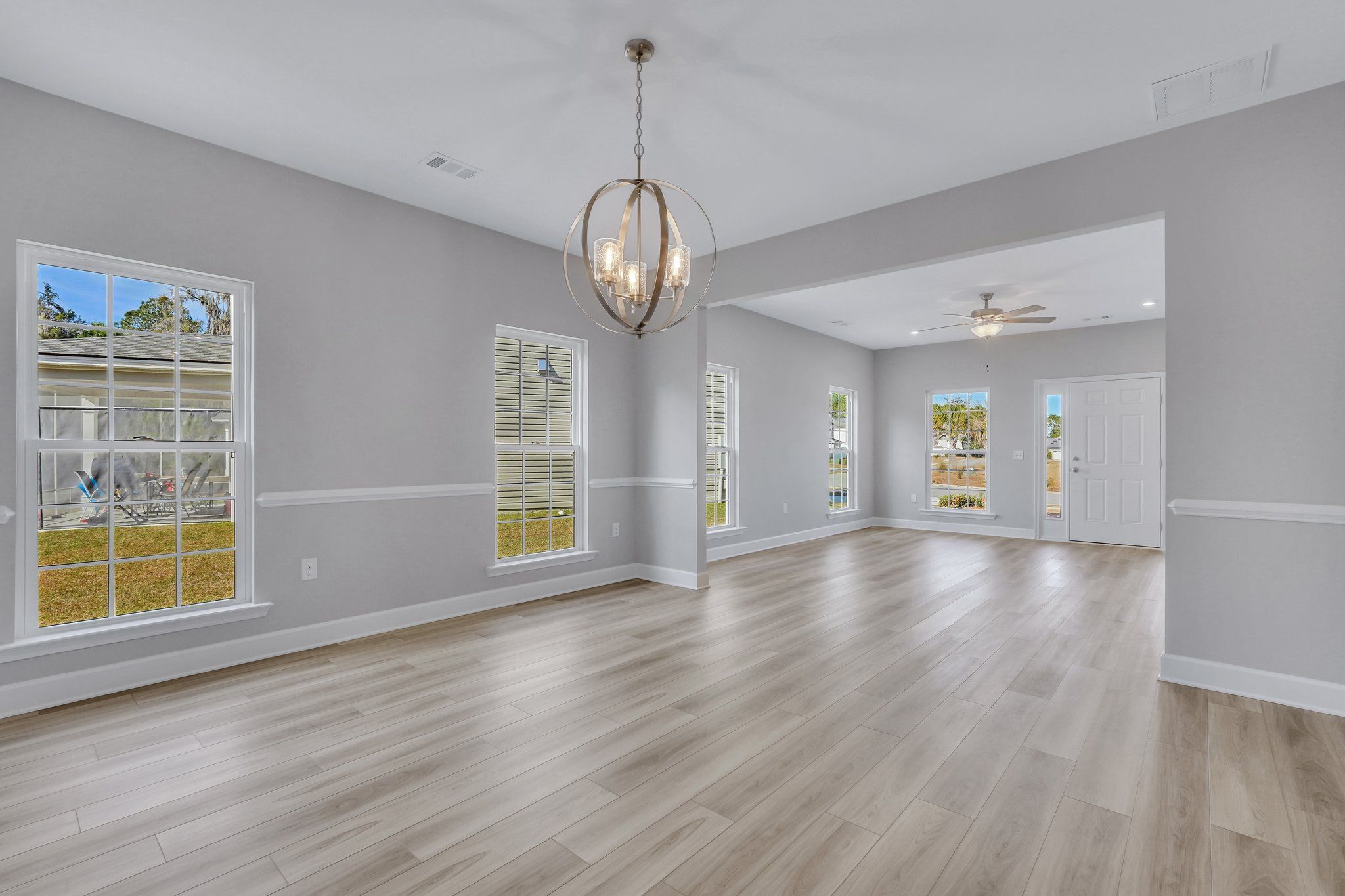 Hatteras Signature - Dining Area and Family Room | Ernest Homes