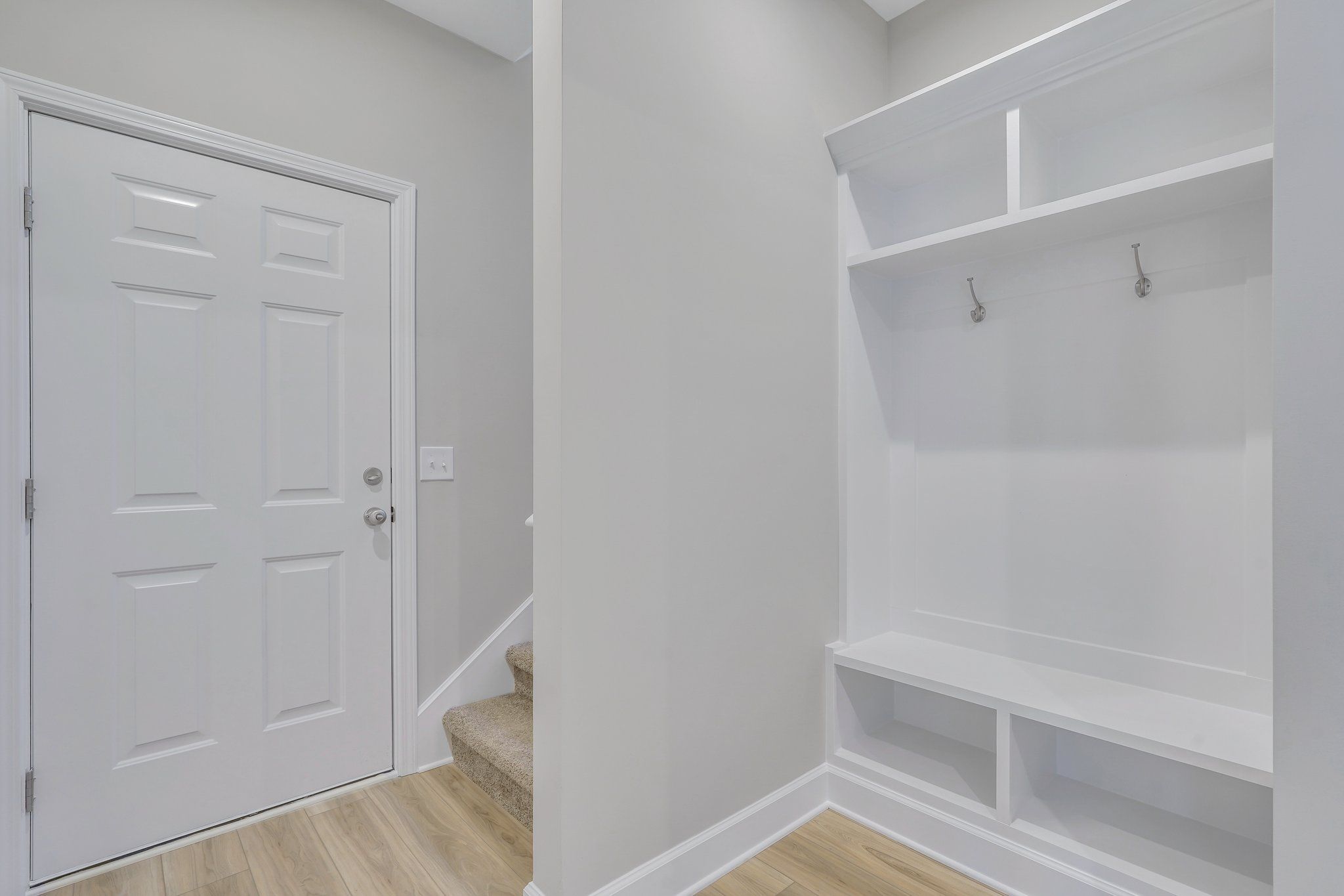 Hatteras Signature– Custom Built-In Mud Room Bench | Ernest Homes