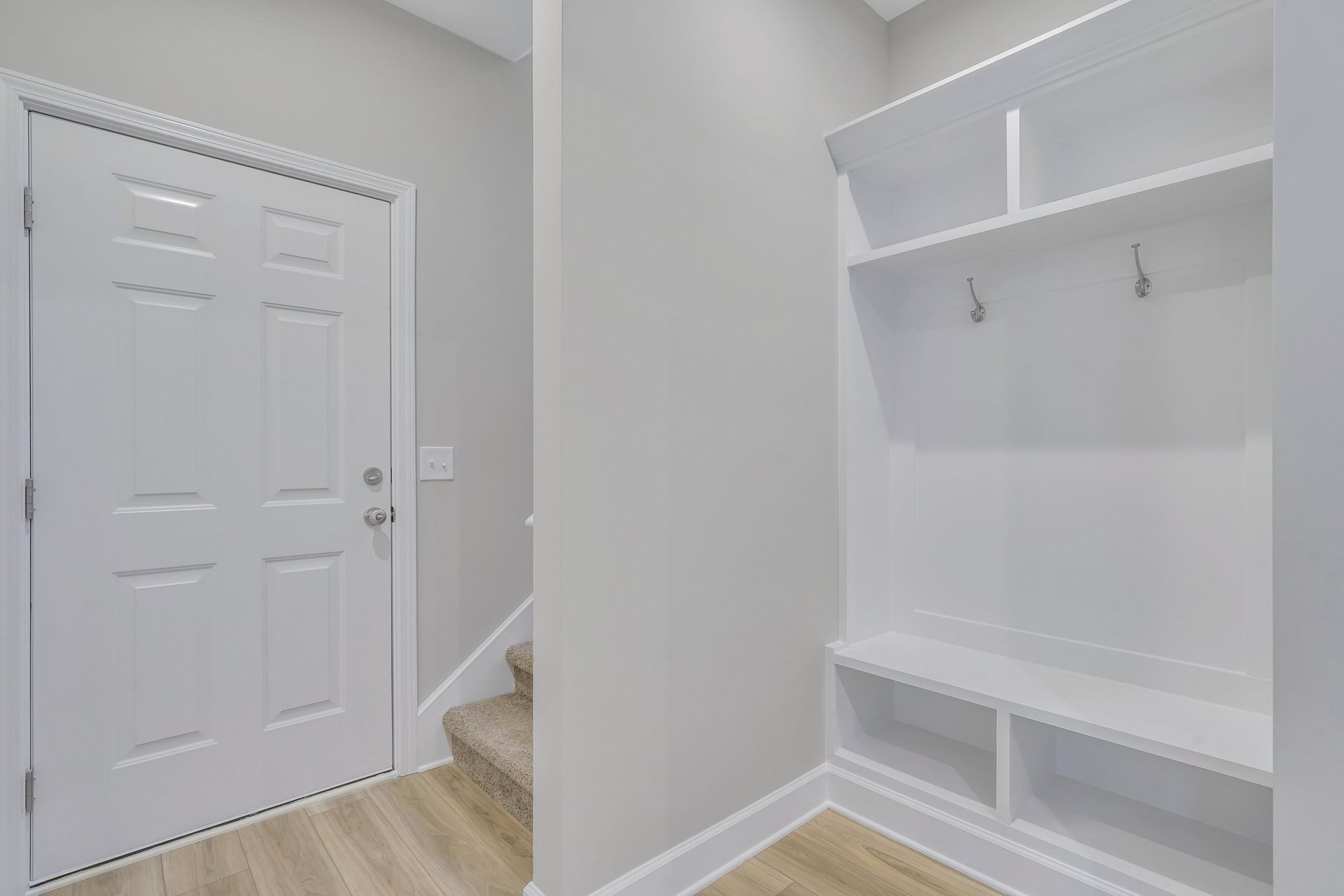 Hatteras Signature– Custom Built-In Mud Room Bench | Ernest Homes