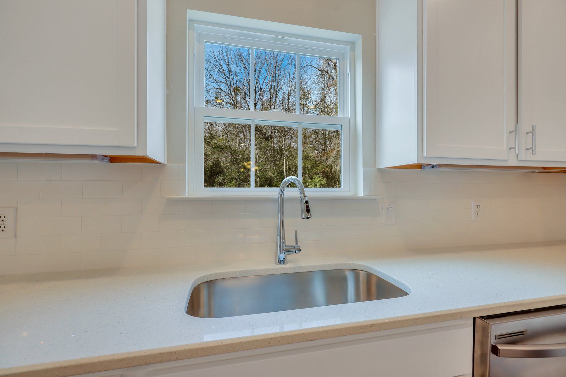 Kitchen sink and window of Nantucket plan | Ernest Homes