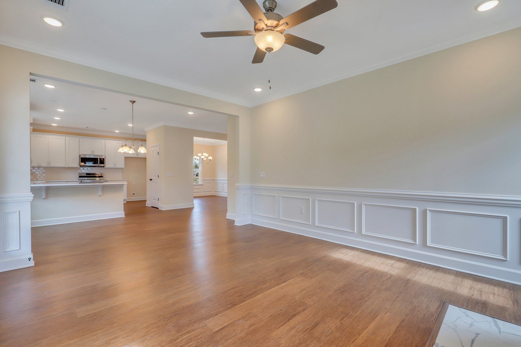 View from family room to dining room and kitchen - Nantucket plan  | Ernest Homes