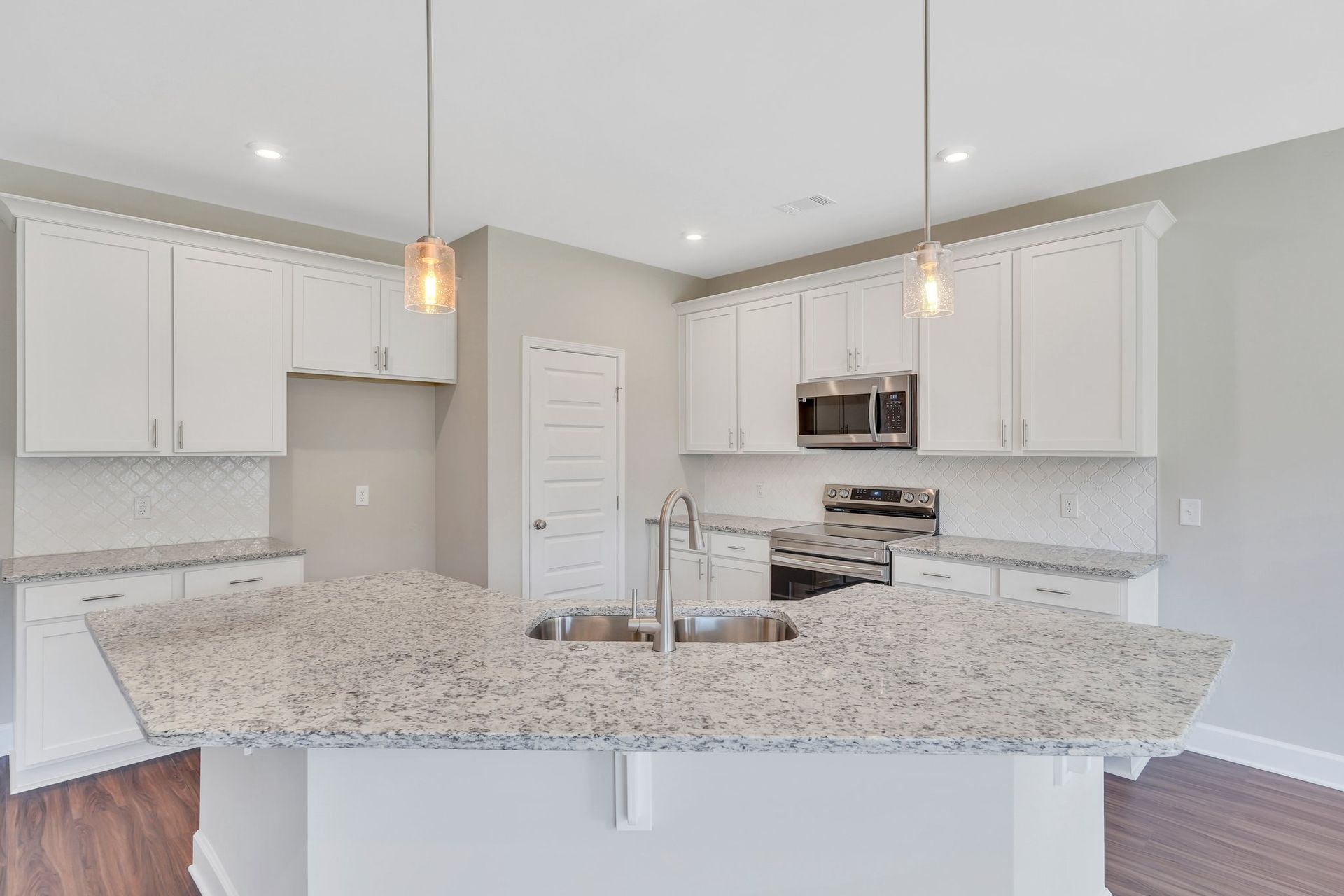 Madison – Kitchen with White Cabinets