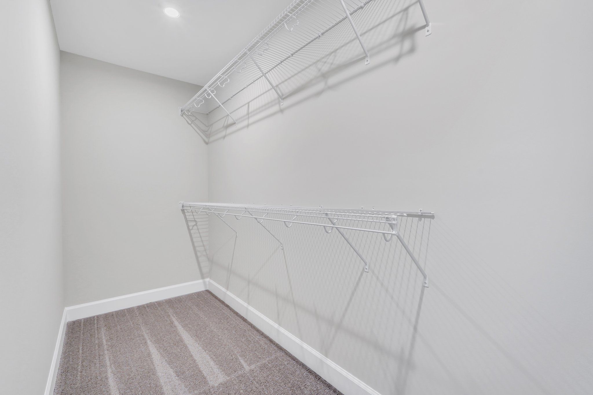 Madison - Secondary Bedroom walk-in closet | Ernest Homes