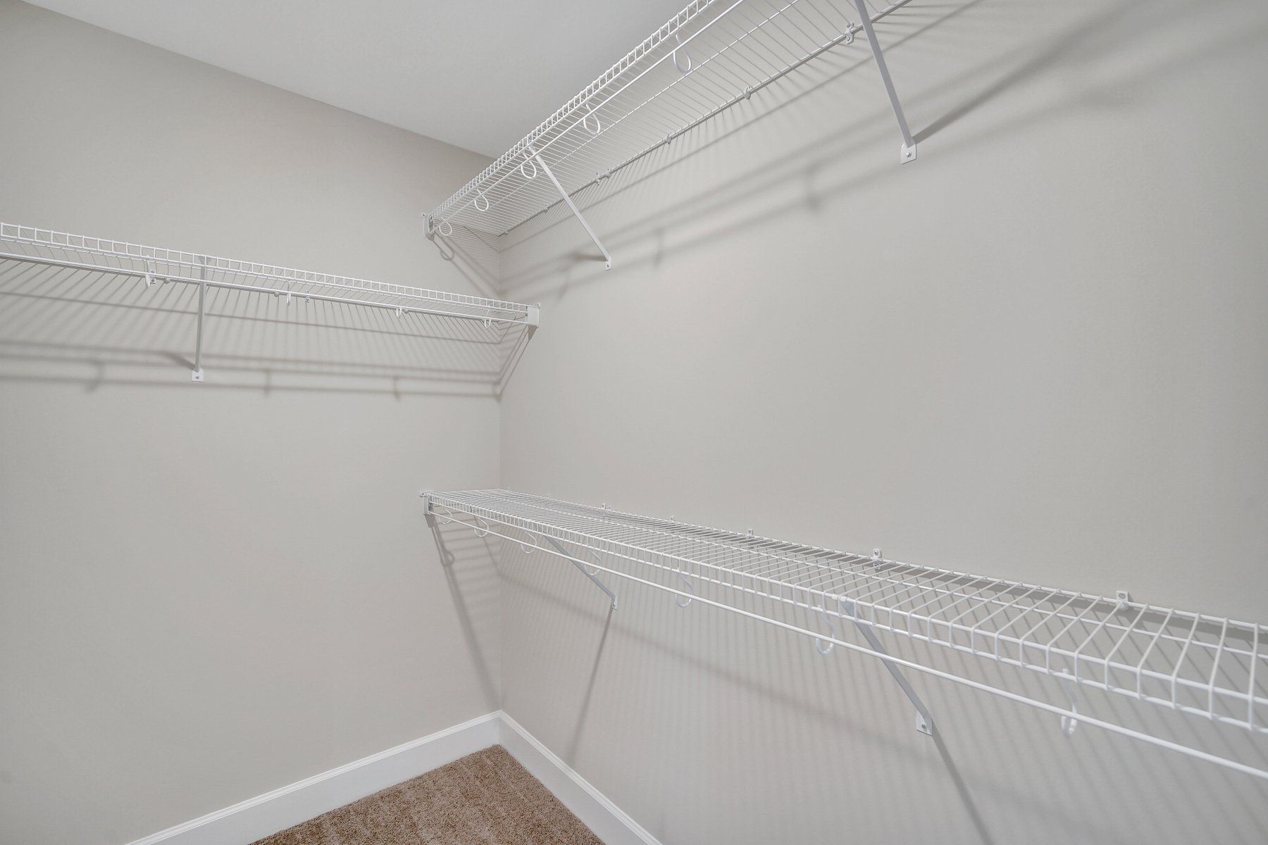 Hilton Owner’s Suite Walk-In Closet | Ernest Homes
