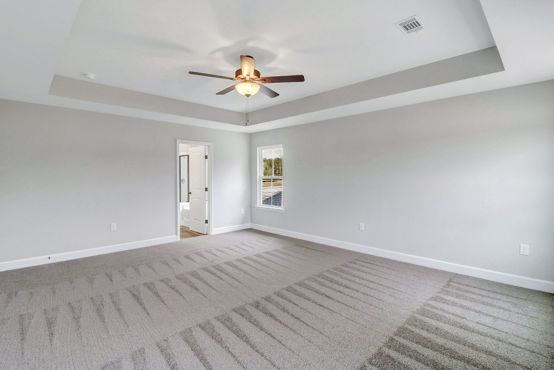 Greybeard  – Owner’s Suite with Tray Ceiling | Ernest Homes