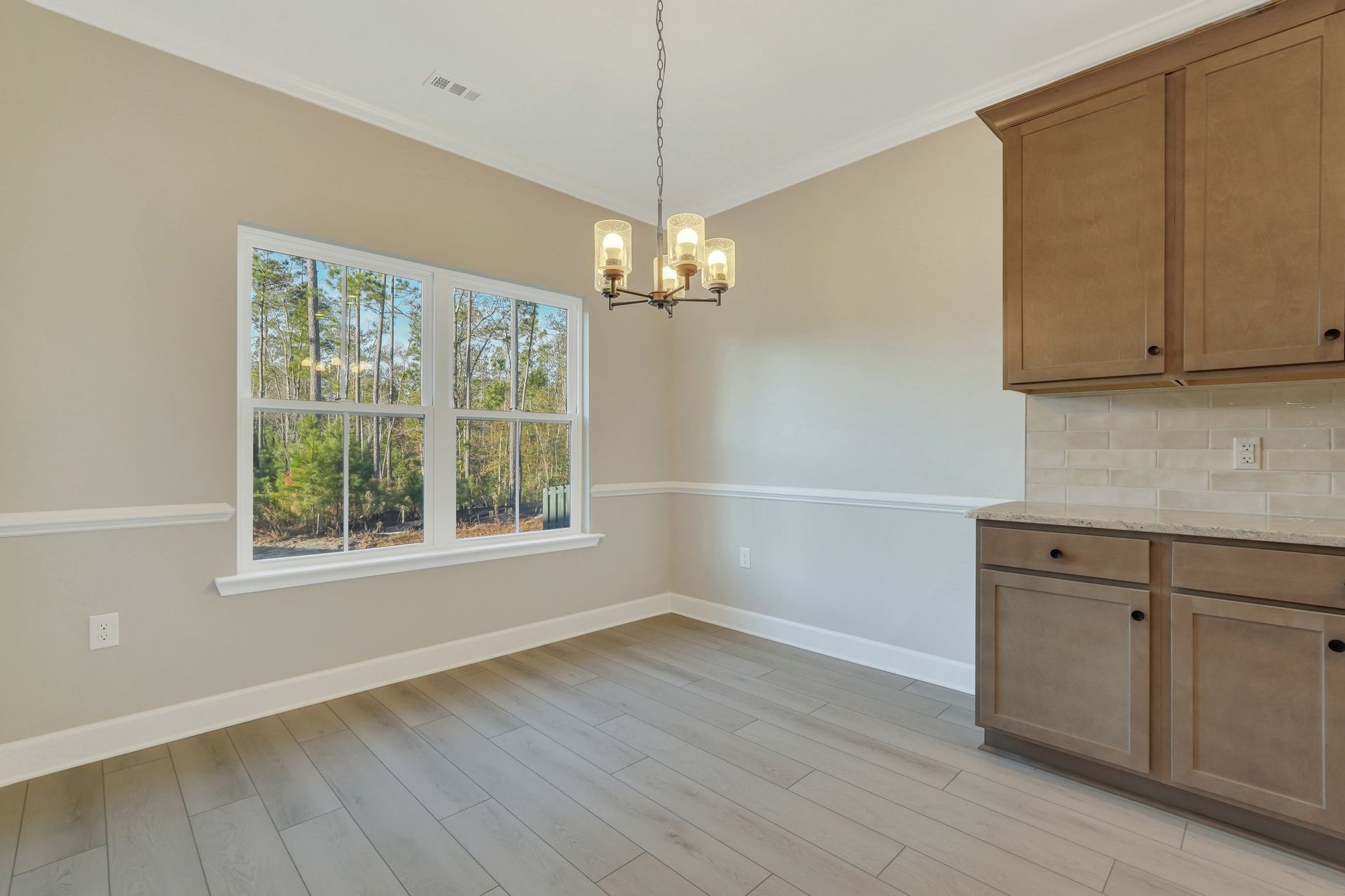 Harbor II Breakfast Area with Wood Cabinetry