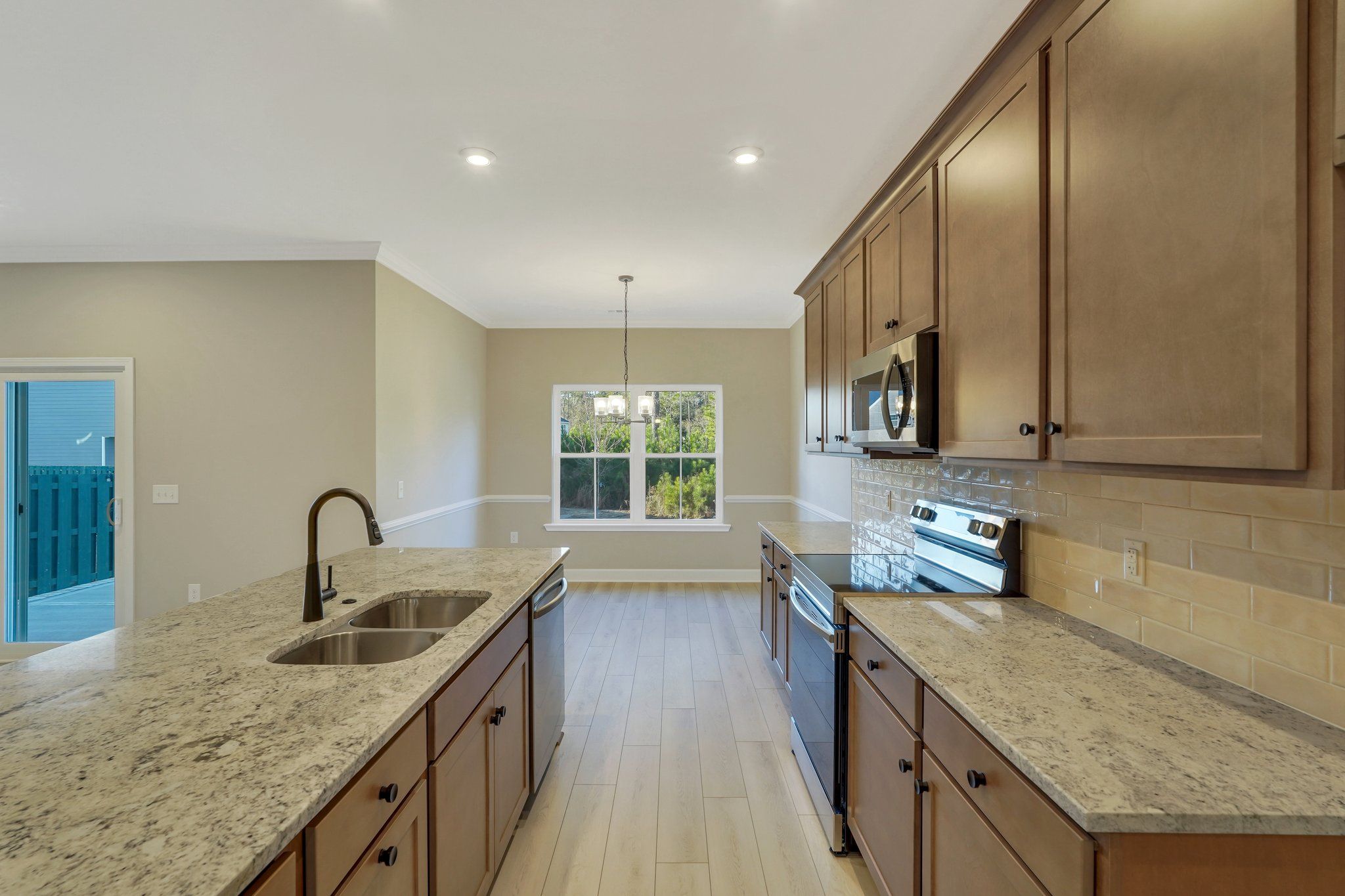 Harbor II Kitchen with Extended Counter Space and Wood Cabinets