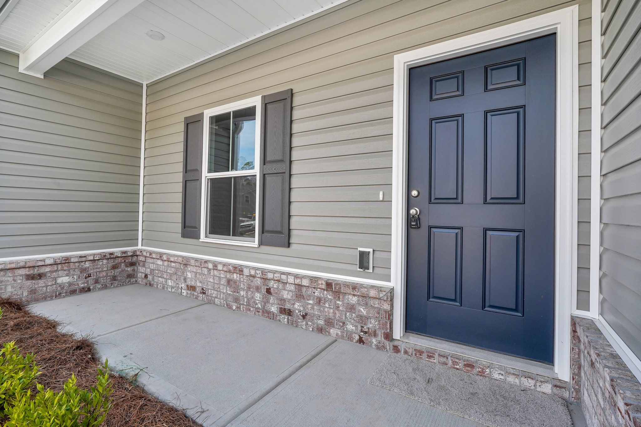 New Haven Townhome B - Front Covered Porch | Ernest Homes