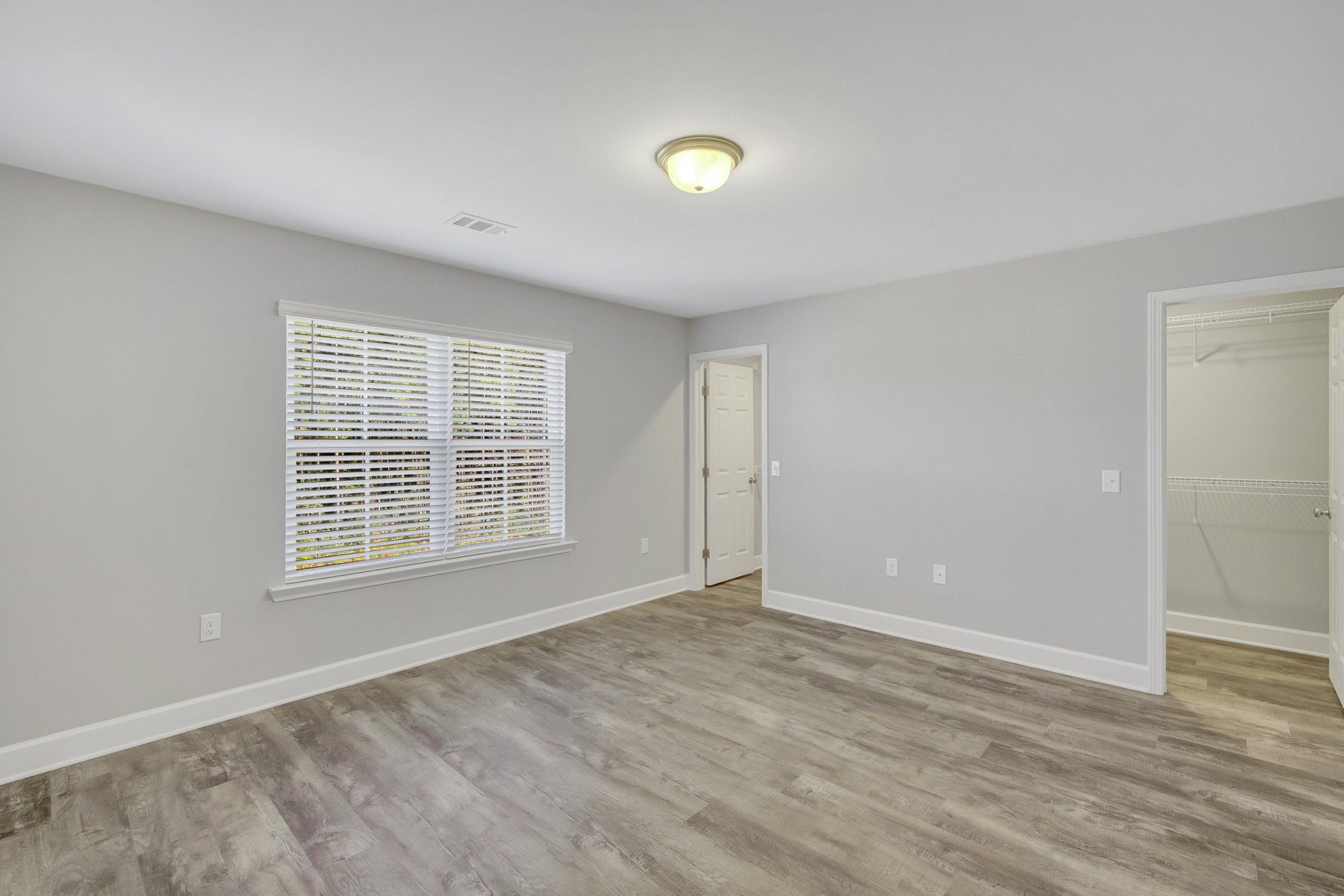 Nantucket Signature - Bedroom 2 with two walk in closets | Ernest Homes