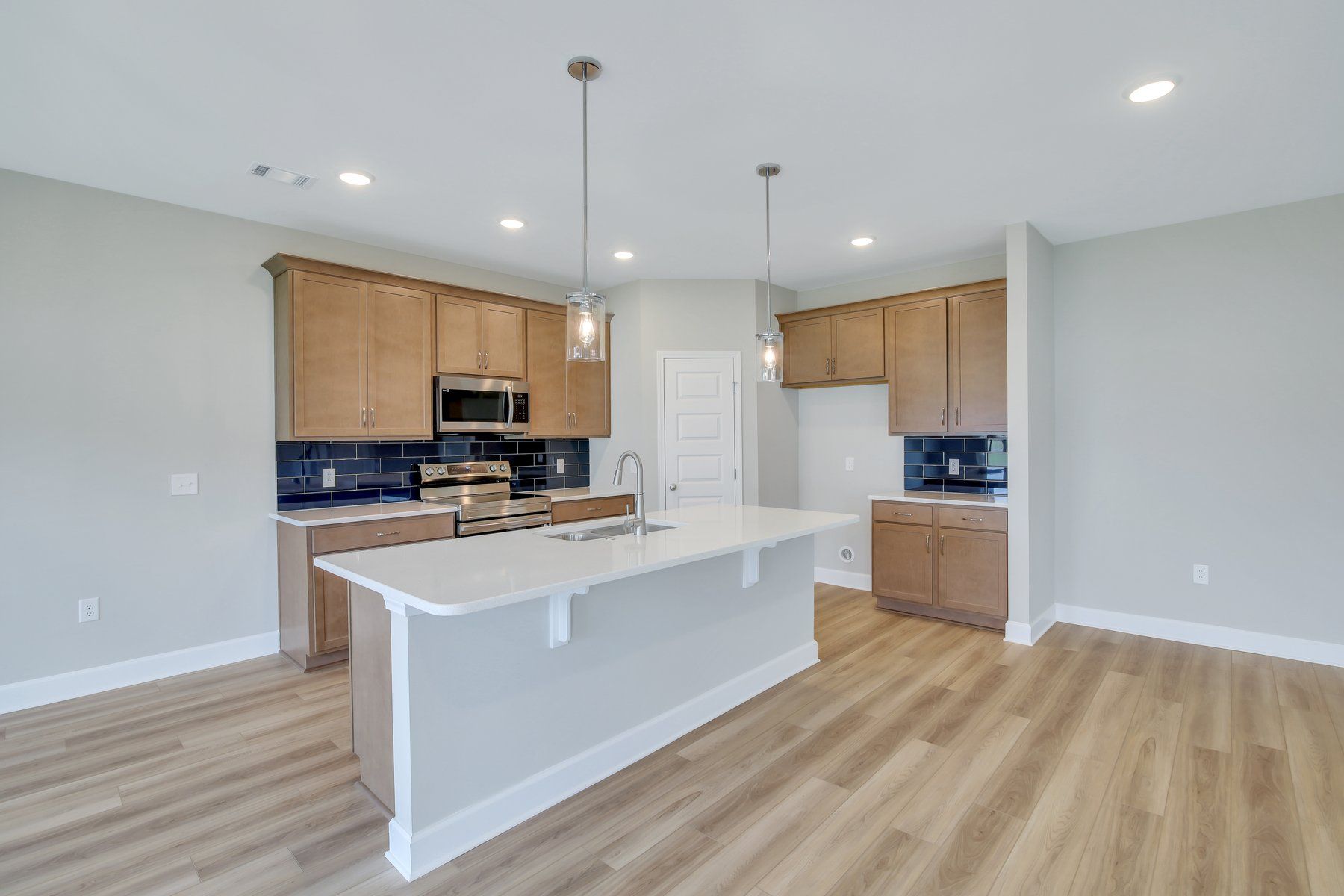 Seabrook Kitchen and Walk-In Pantry View | Ernest Homes